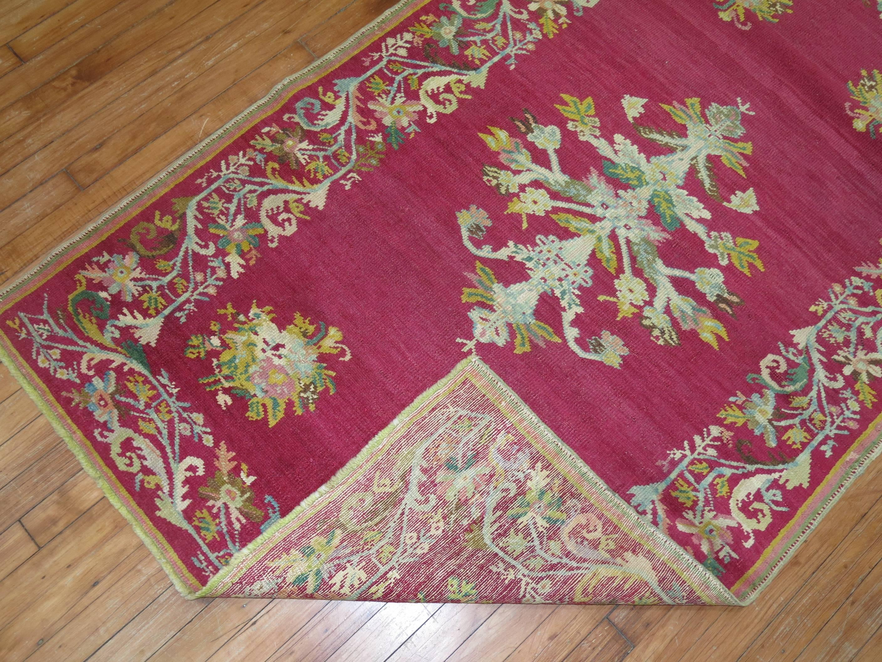 Stunning Raspberry Turkish Ghiordes Floral Carpet In Good Condition For Sale In New York, NY