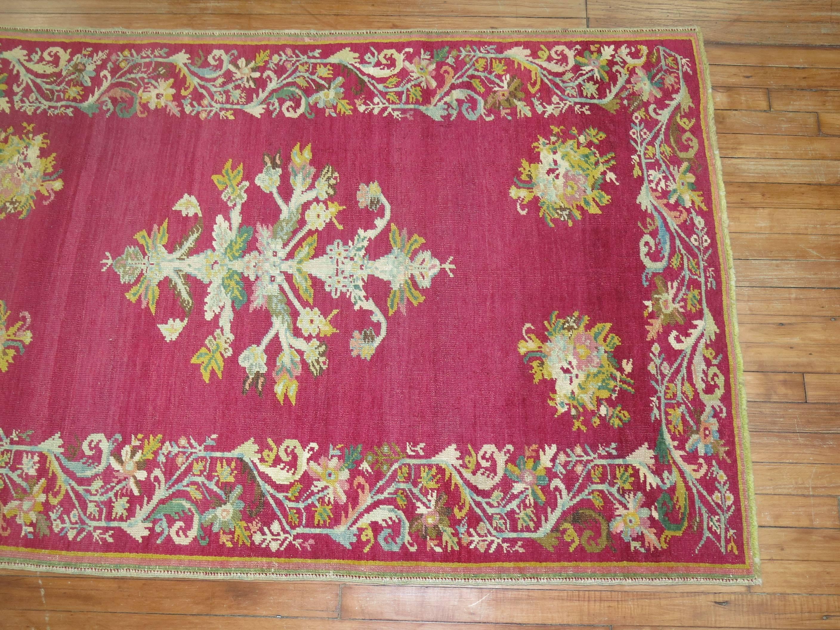 20th Century Stunning Raspberry Turkish Ghiordes Floral Carpet For Sale