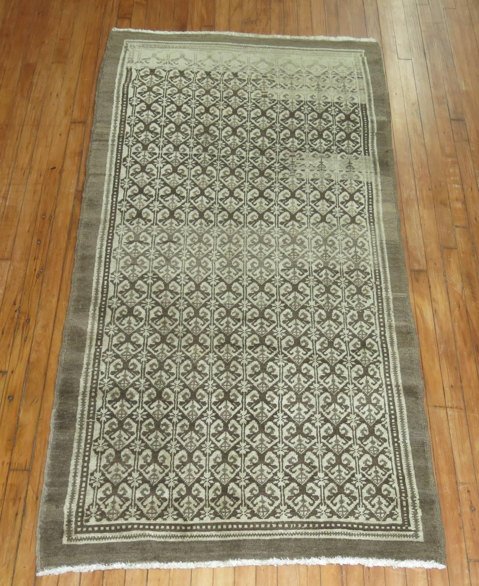 One of a kind vintage Turkish village rug in brown and ivory hues, circa mid-20th century.

Size: 3'7” x 7'4”.