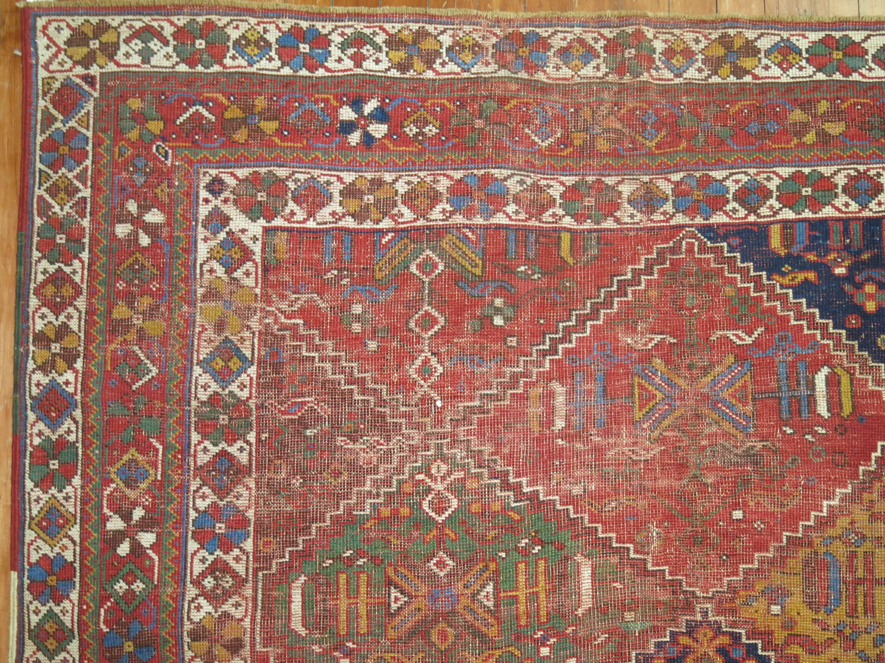 Zabihi Collection Persian Colorful Tribal Accent Size Rug In Fair Condition For Sale In New York, NY