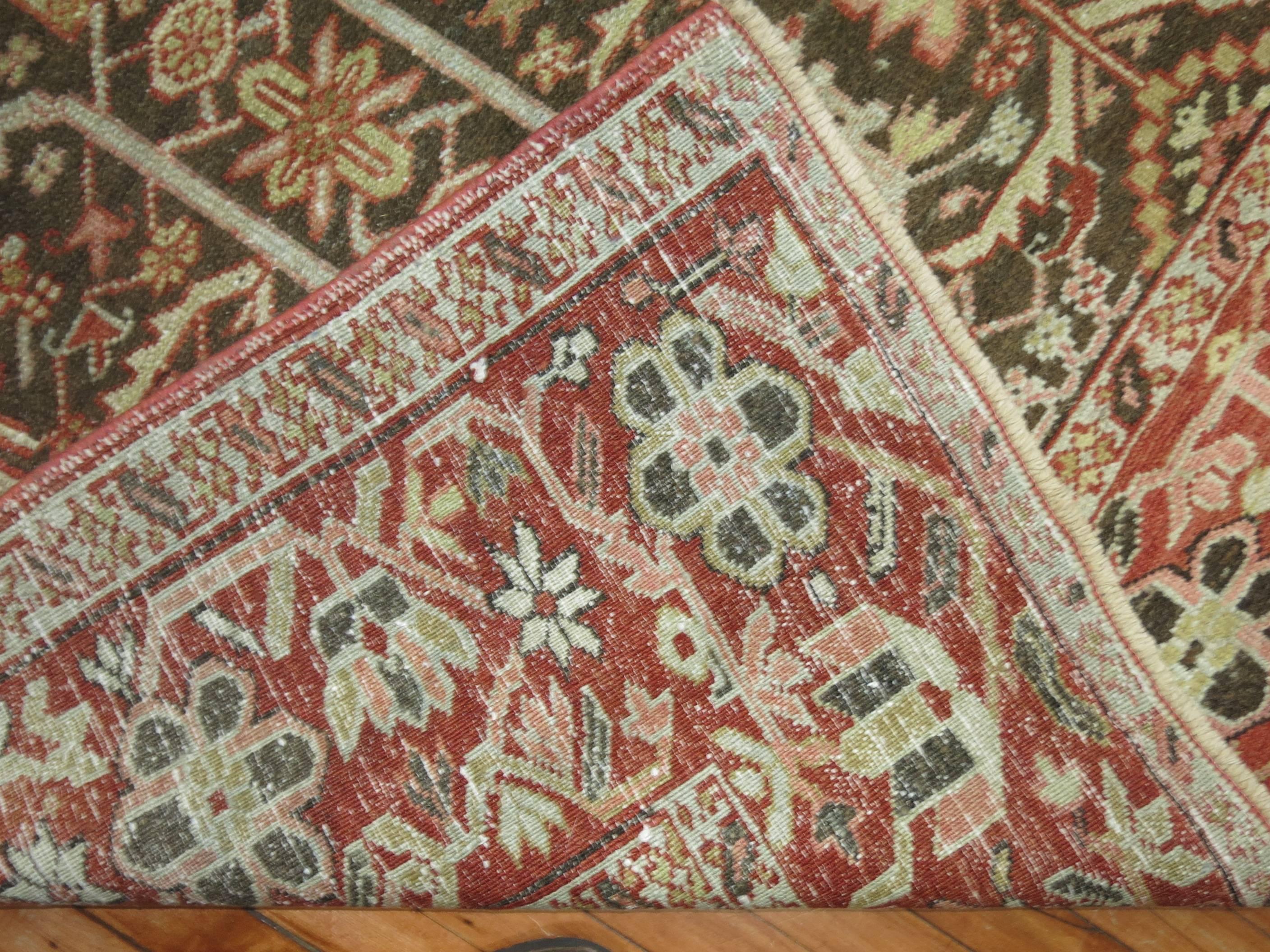 An early 20th-century Northwest Persian Heriz rug

Measures: 9' x 11'8''

The best early 20th century decorative antique Persian Heriz carpets are found in their design, style and color. Older antique Heriz rugs, echoing the famous antique 19th