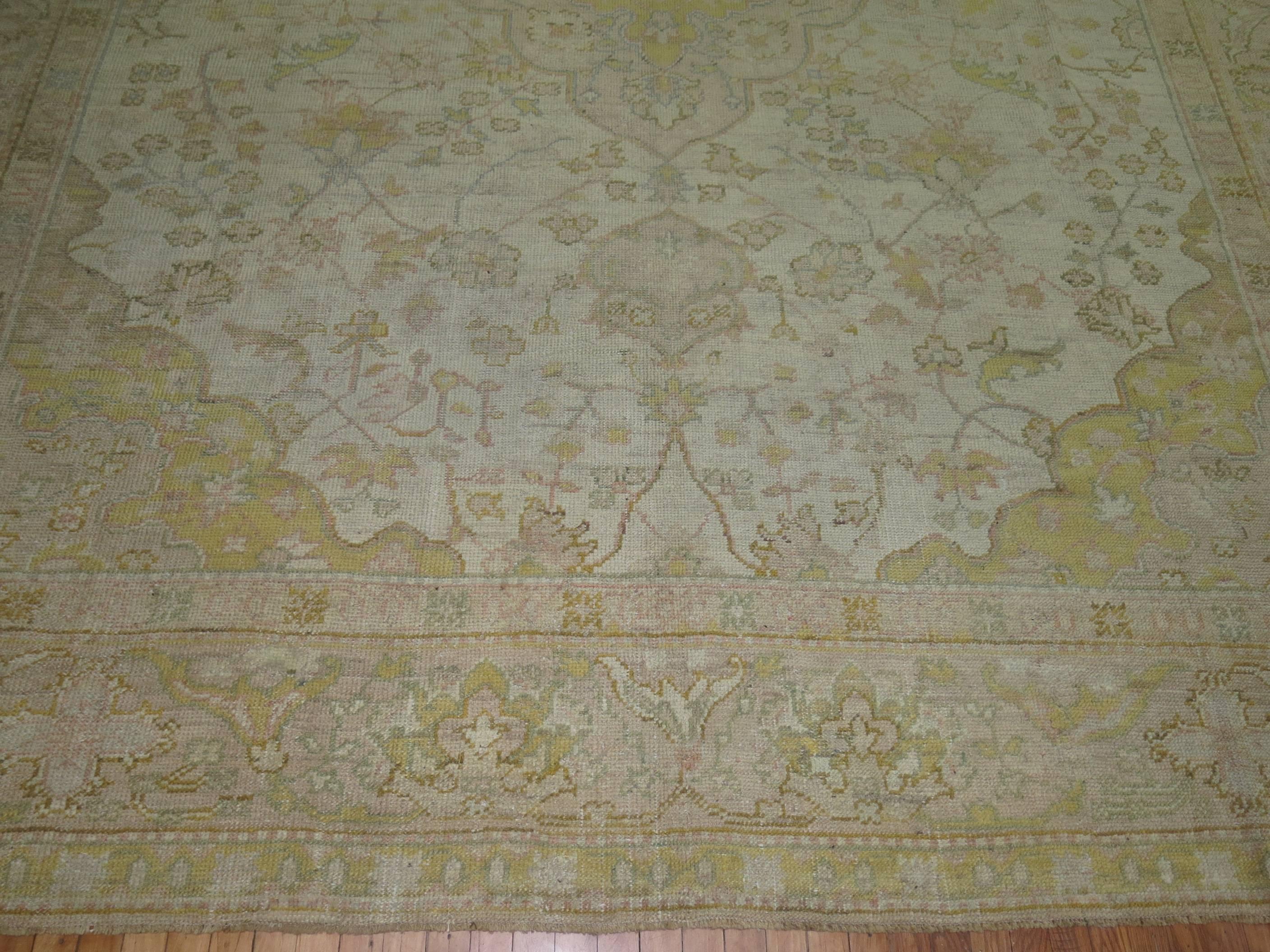 Wool Ivory Pink Yellow Antique Turkish Oushak Rug, Early 20th Century For Sale