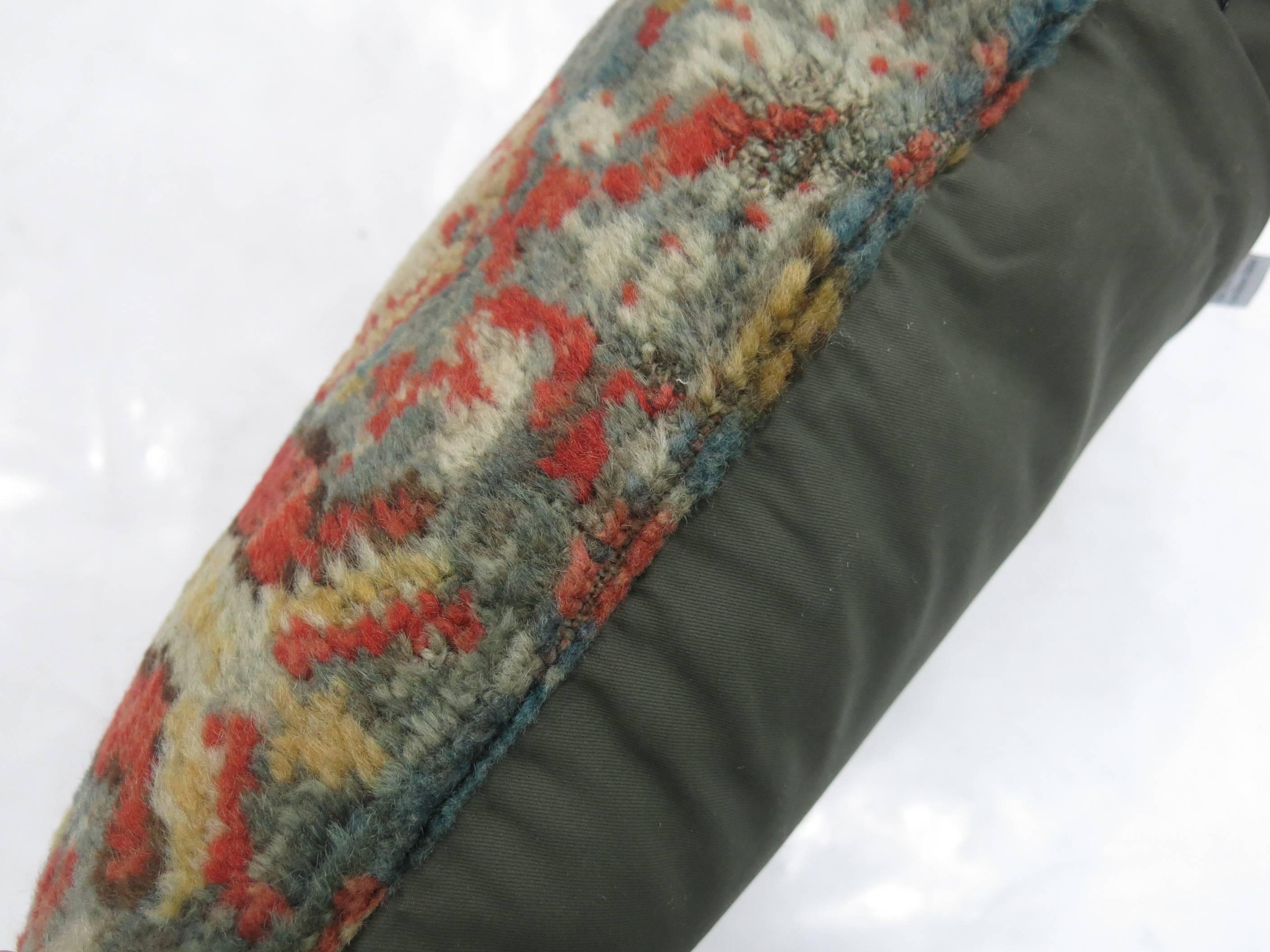 Pillow made from an early 20th century Turkish Oushak rug. Green and soft red.

Measures: 1'4