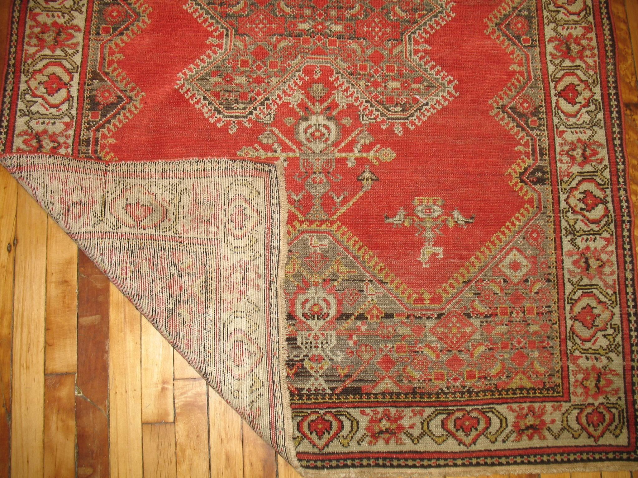 Vintage Persian Malayer rug in reds and brown,

circa 1940. Measures: 4' x 6'3''.