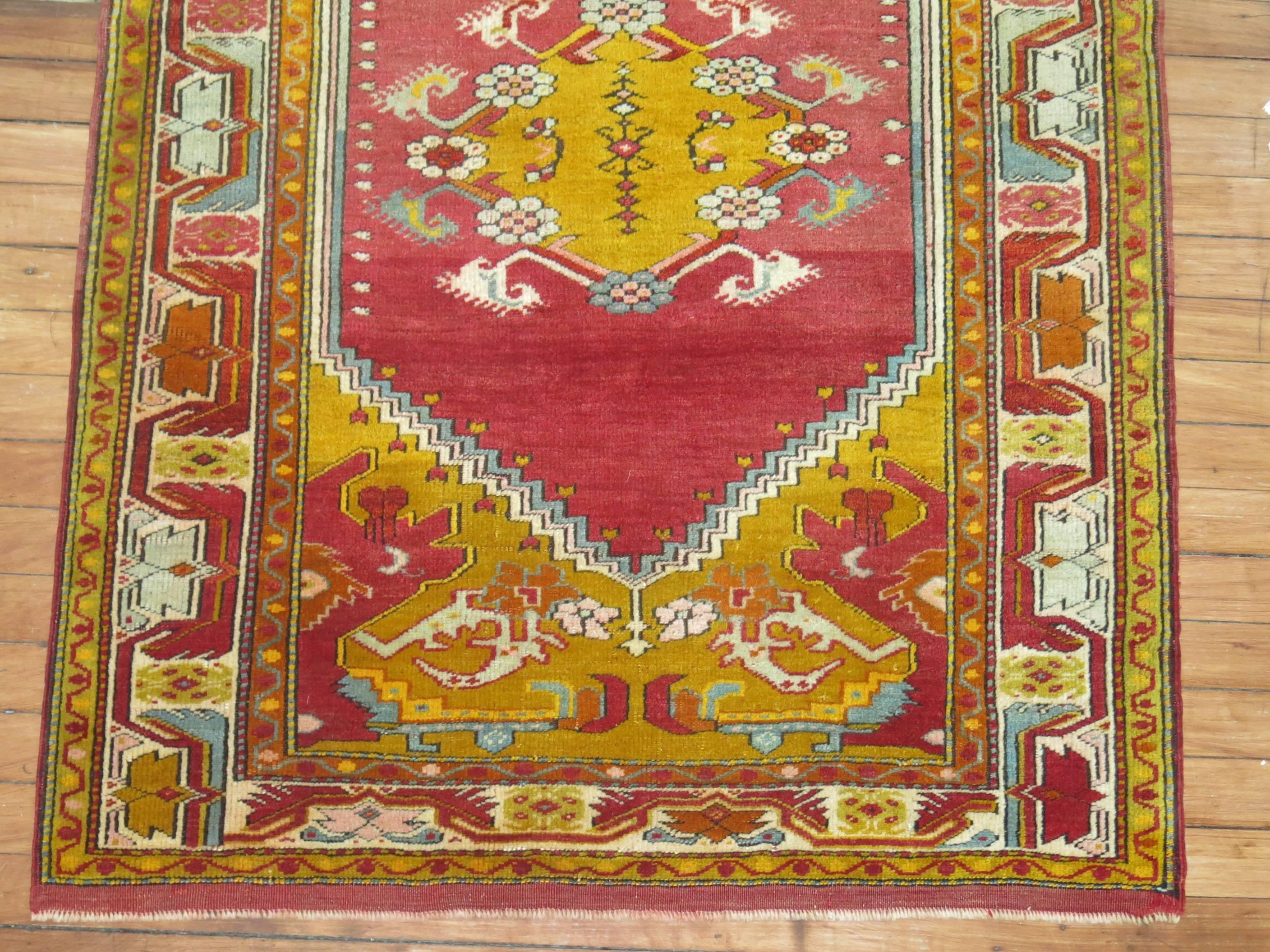 Turkish throw size rug featuring bright colors.