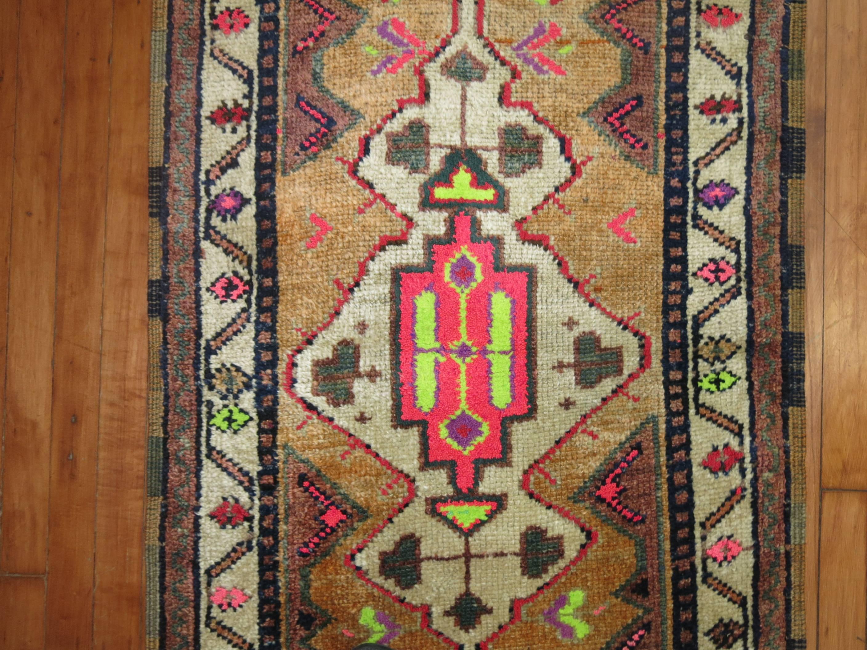 Vintage Turkish Anatolian Bohemian small size runner featuring cotton accents in lime green and hot pink.

2'7'' x 8'2''
