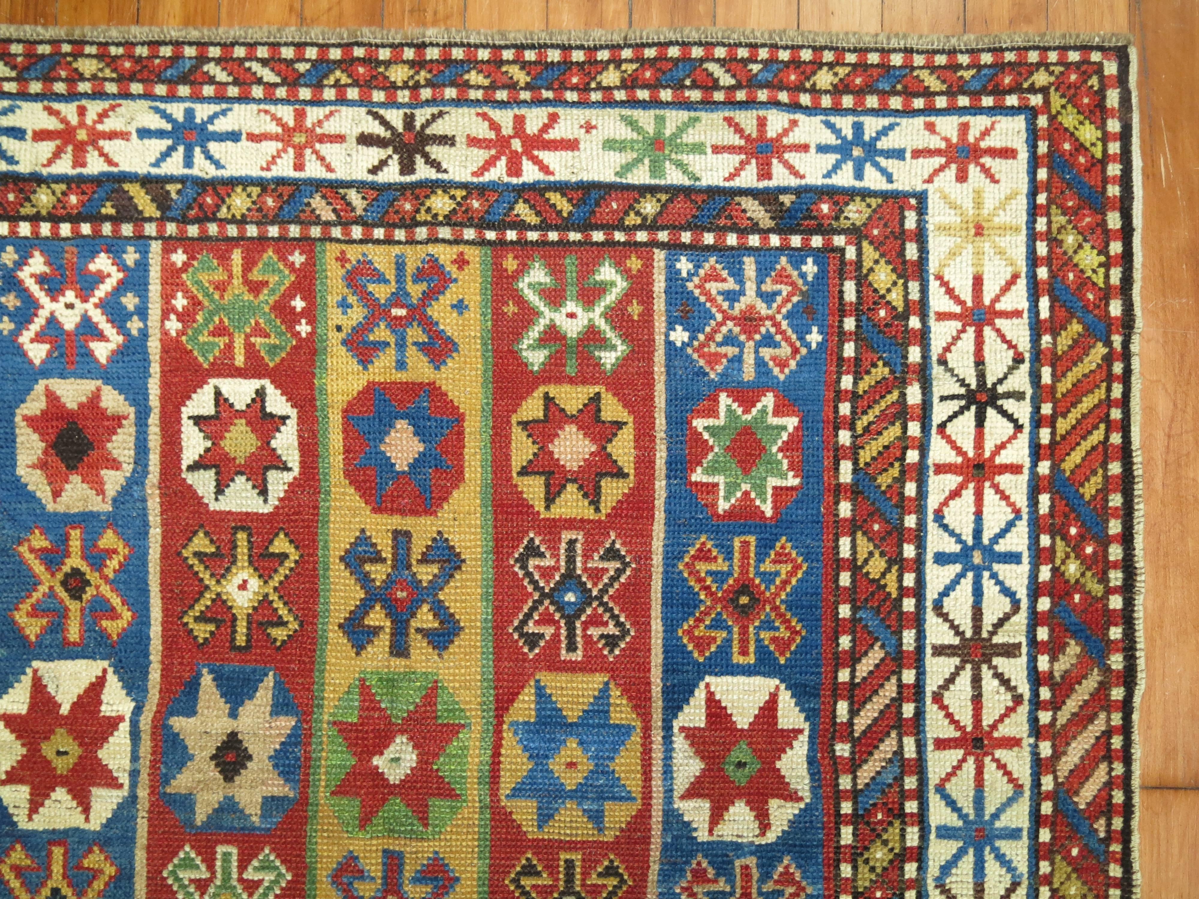 Kazak Whimsical Early 20th Century Decorative Antique Caucasian Tribal Rug