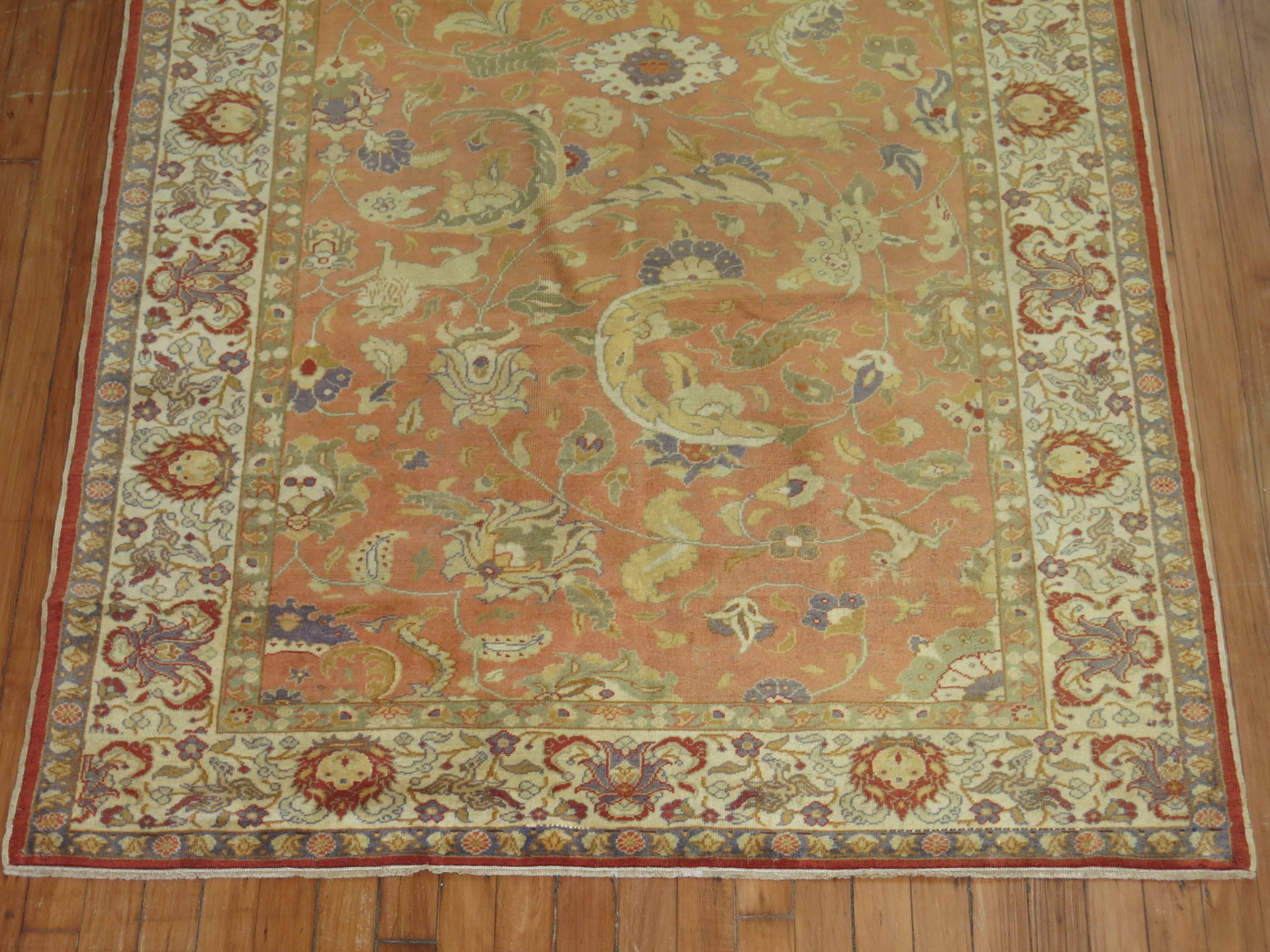 Turkish Pictorial rug with numerous animal figures found on a peach colored ground and antique white border. Pictorial pieces are also commonly used as decorative wall hangings.