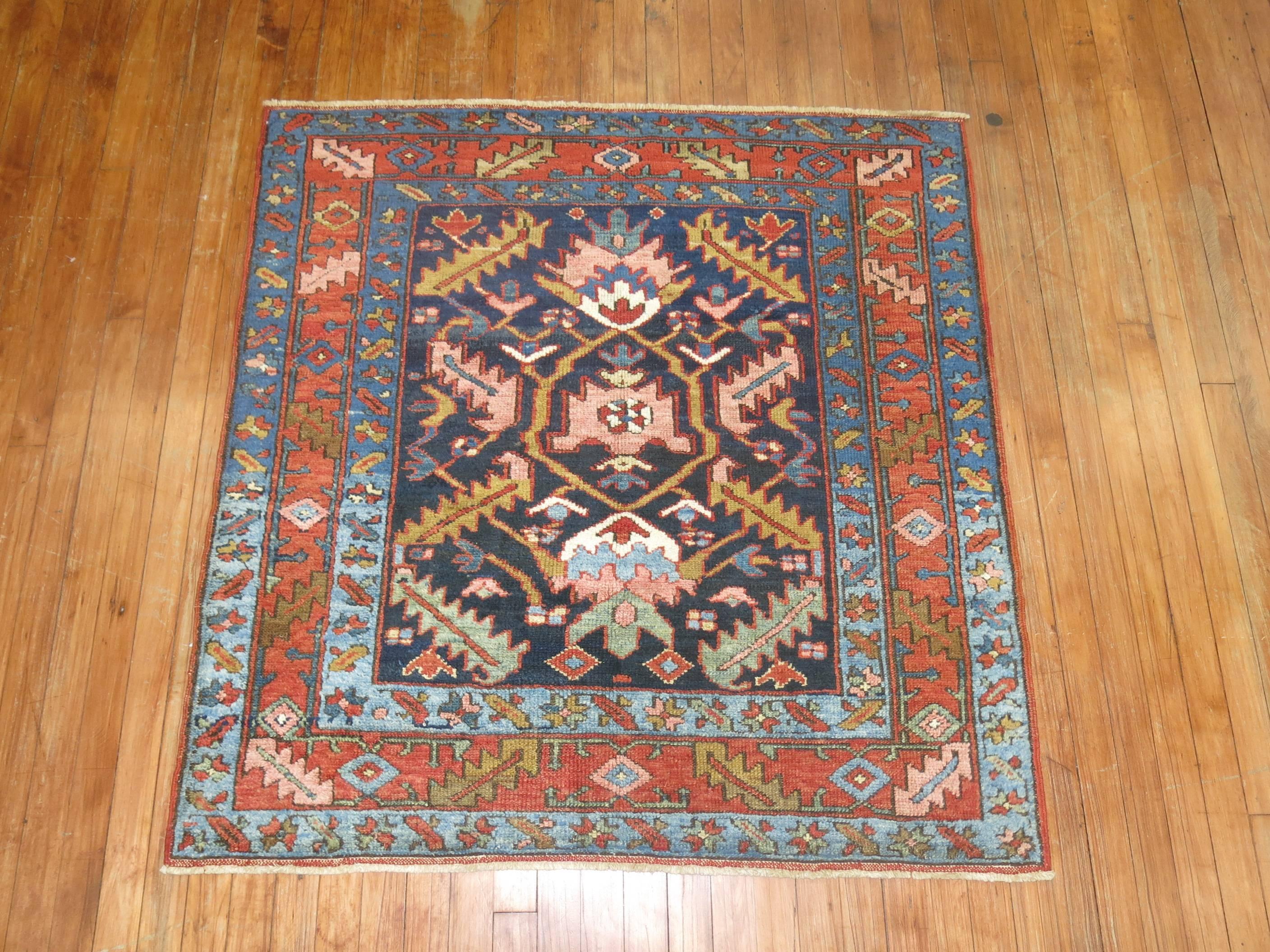 Square shaped Persian antique Persian Heriz rug.