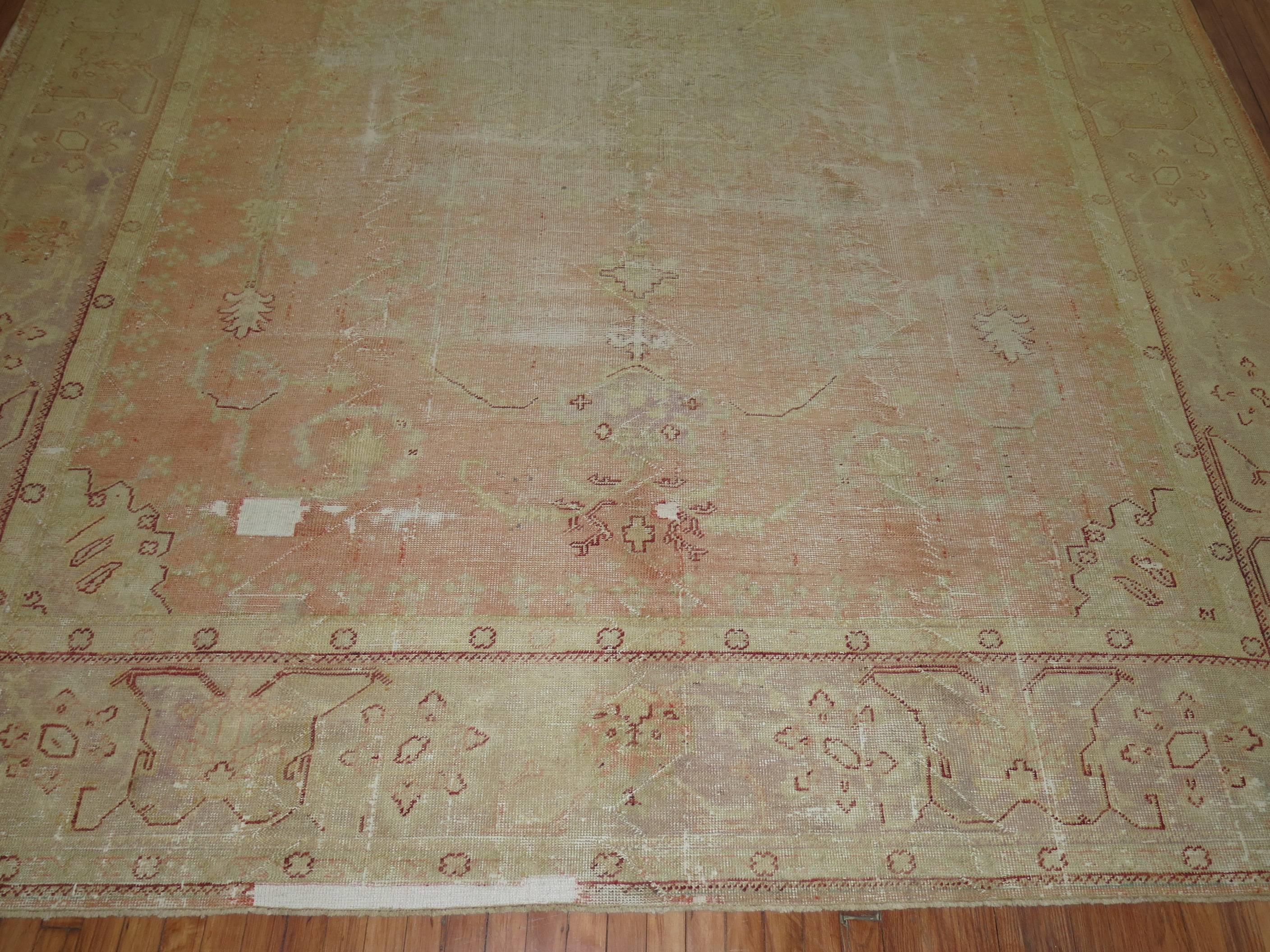 Khotan Shabby Chic Antique Oushak Carpet For Sale