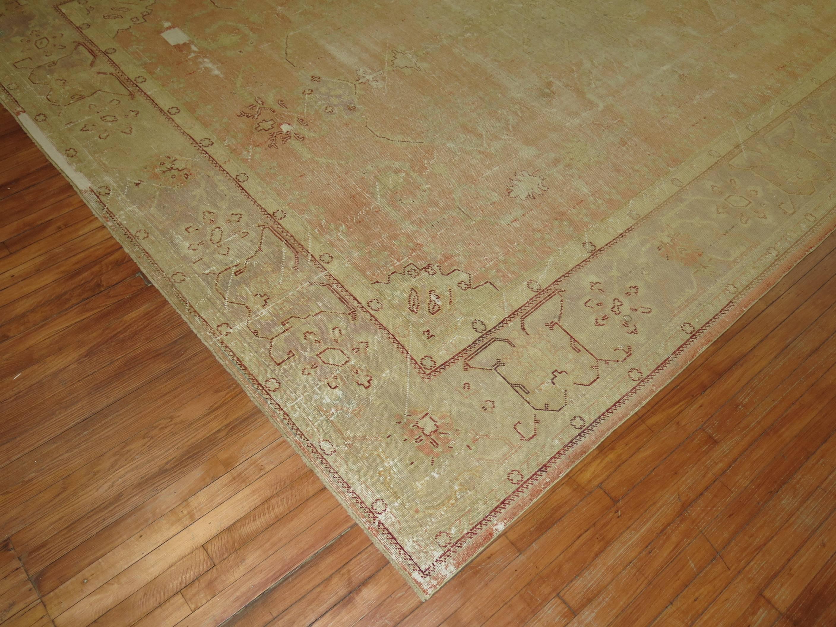 Shabby Chic Antique Oushak Carpet In Fair Condition For Sale In New York, NY