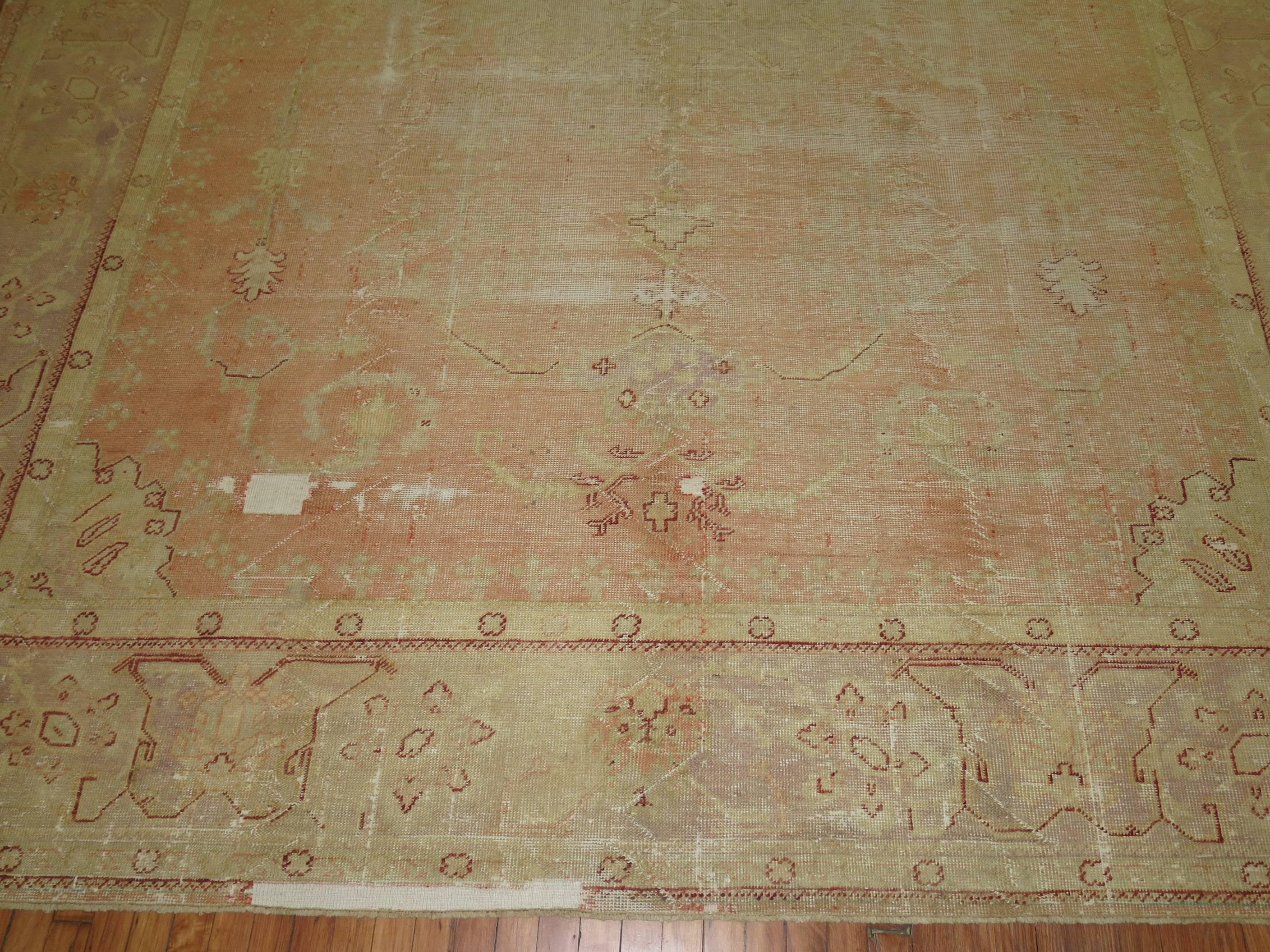 Hand-Woven Shabby Chic Antique Oushak Carpet For Sale