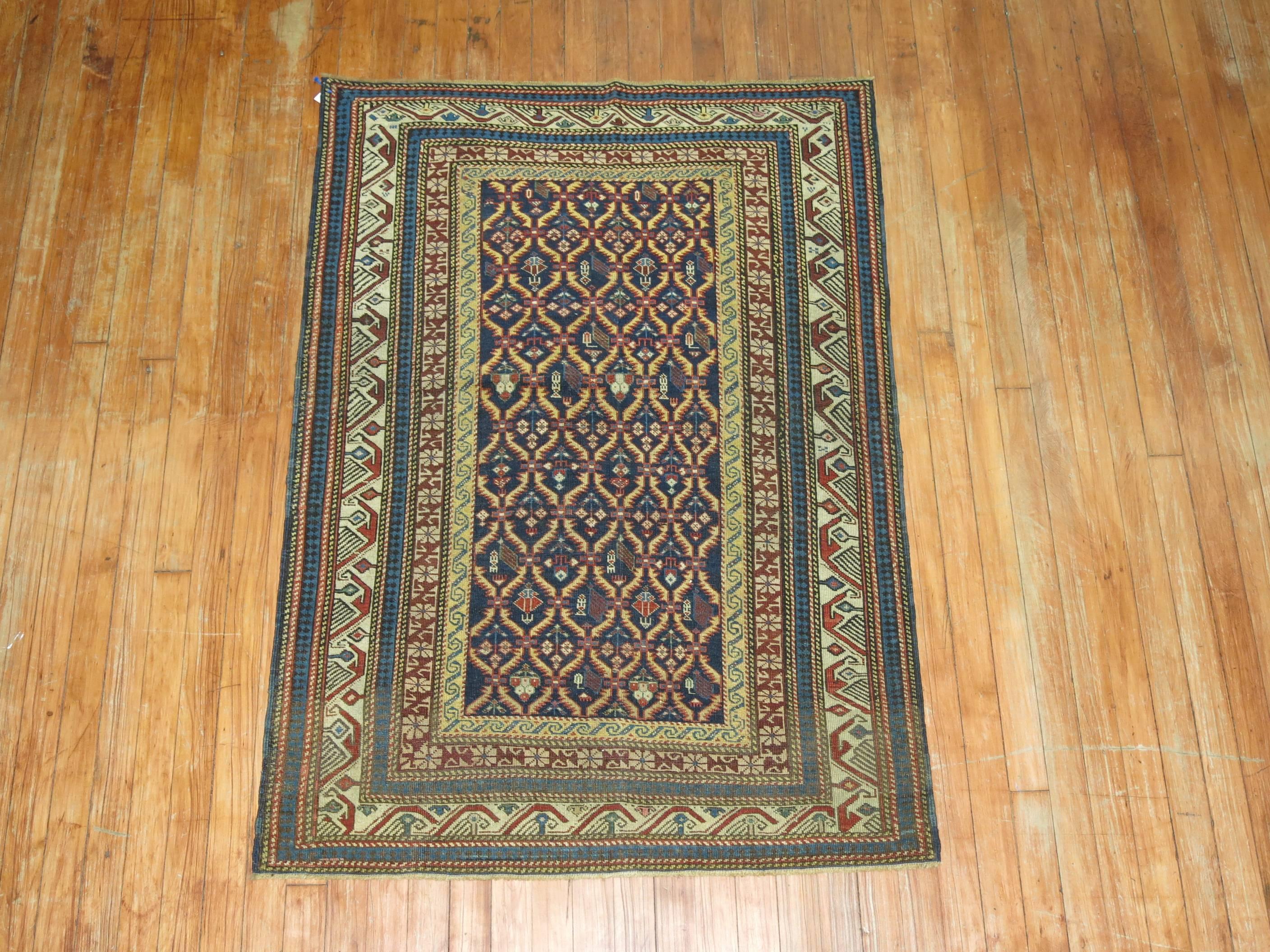 A turn of the 20th century collector level Caucasian Kuba rug. Tight small all-over pattern on a navy ground. The quality is good. 

Measures: 3'2