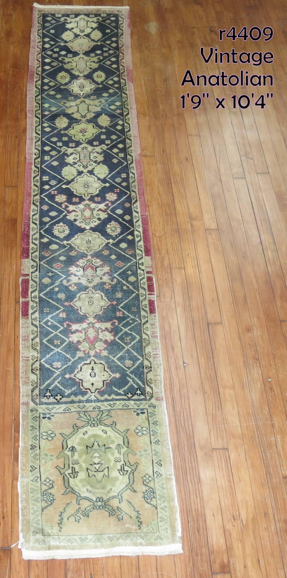 Vintage Turkish Runner with a unusual motif and colors.