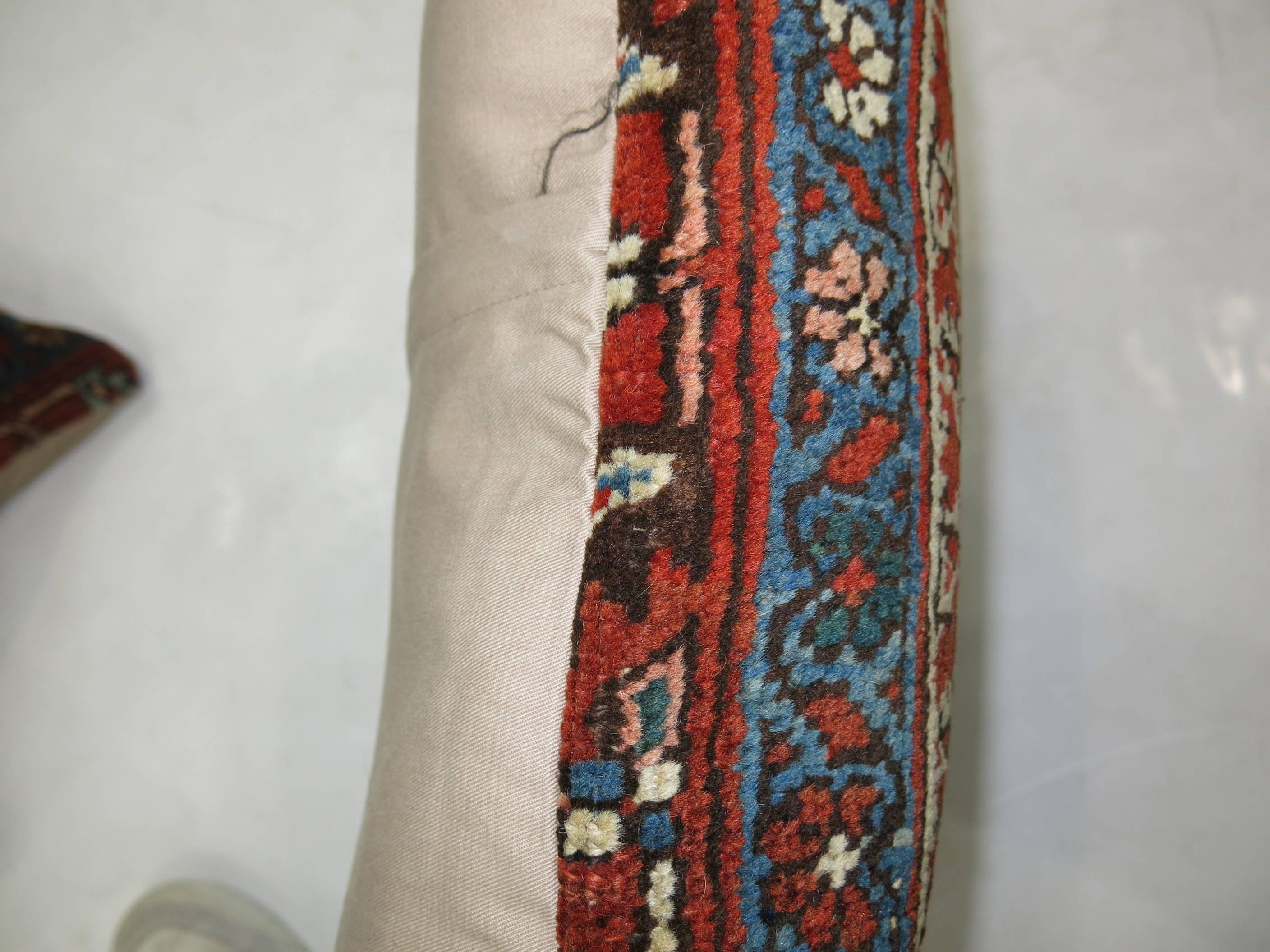 Pillow made from a turn of the century Persian Bidjar rug.