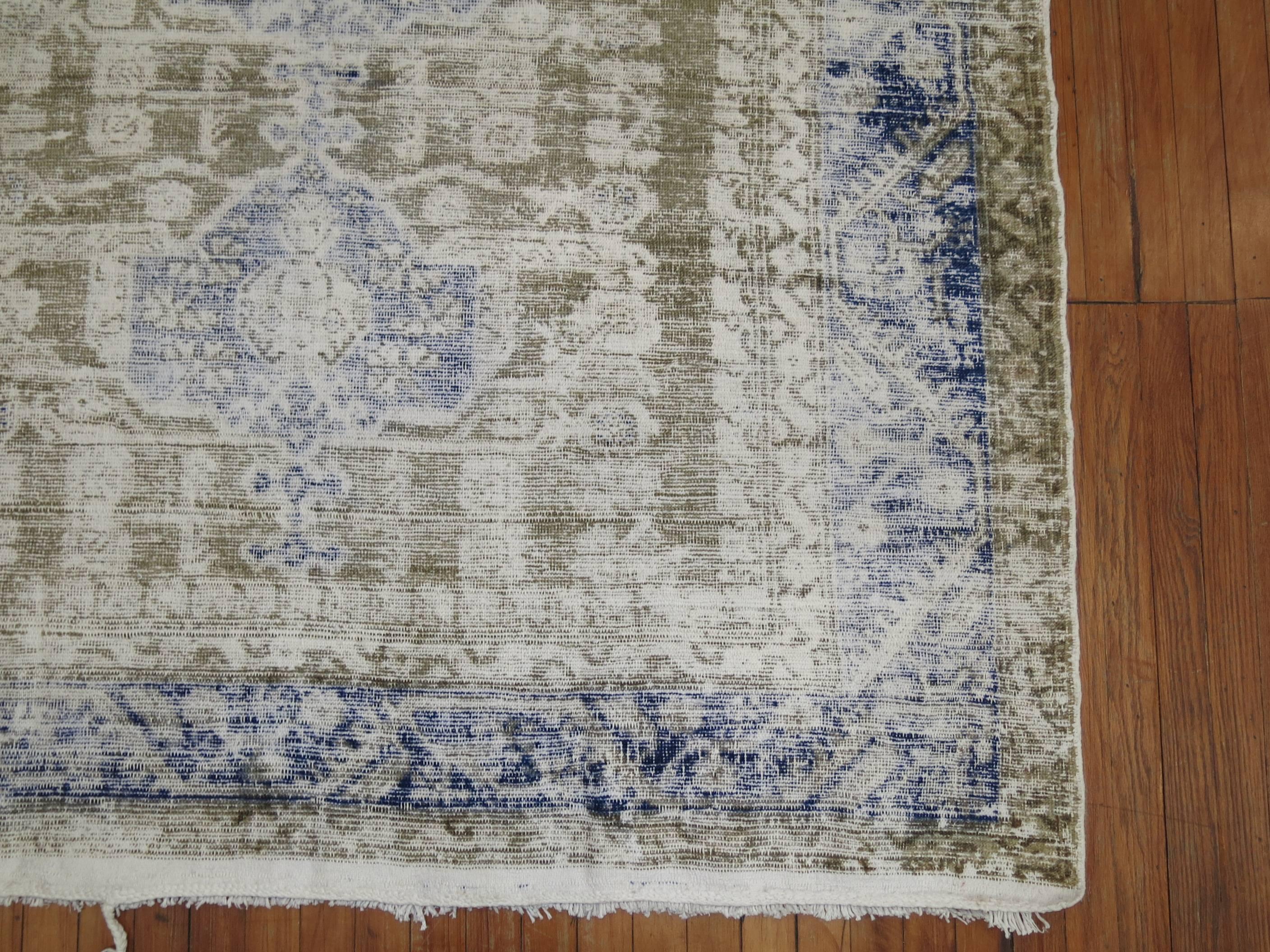 Beautiful worn 20th century gallery size Turkish rug. Faded blues and khaki tones.

Measures: 5'6