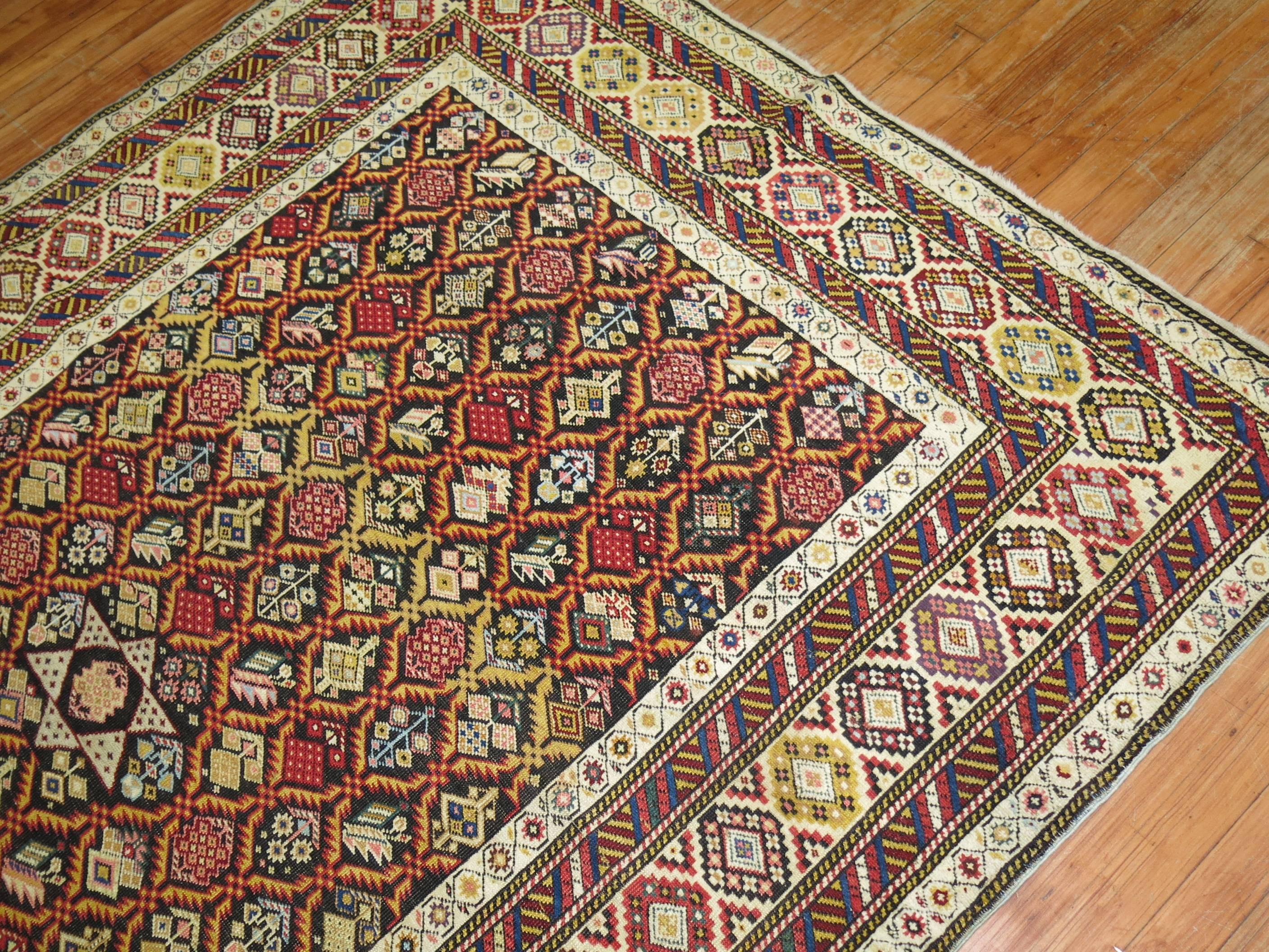 An early 20th century rare intermediate size Caucasian Shirvan rug featuring a star central medallion.

Measures: 5'9