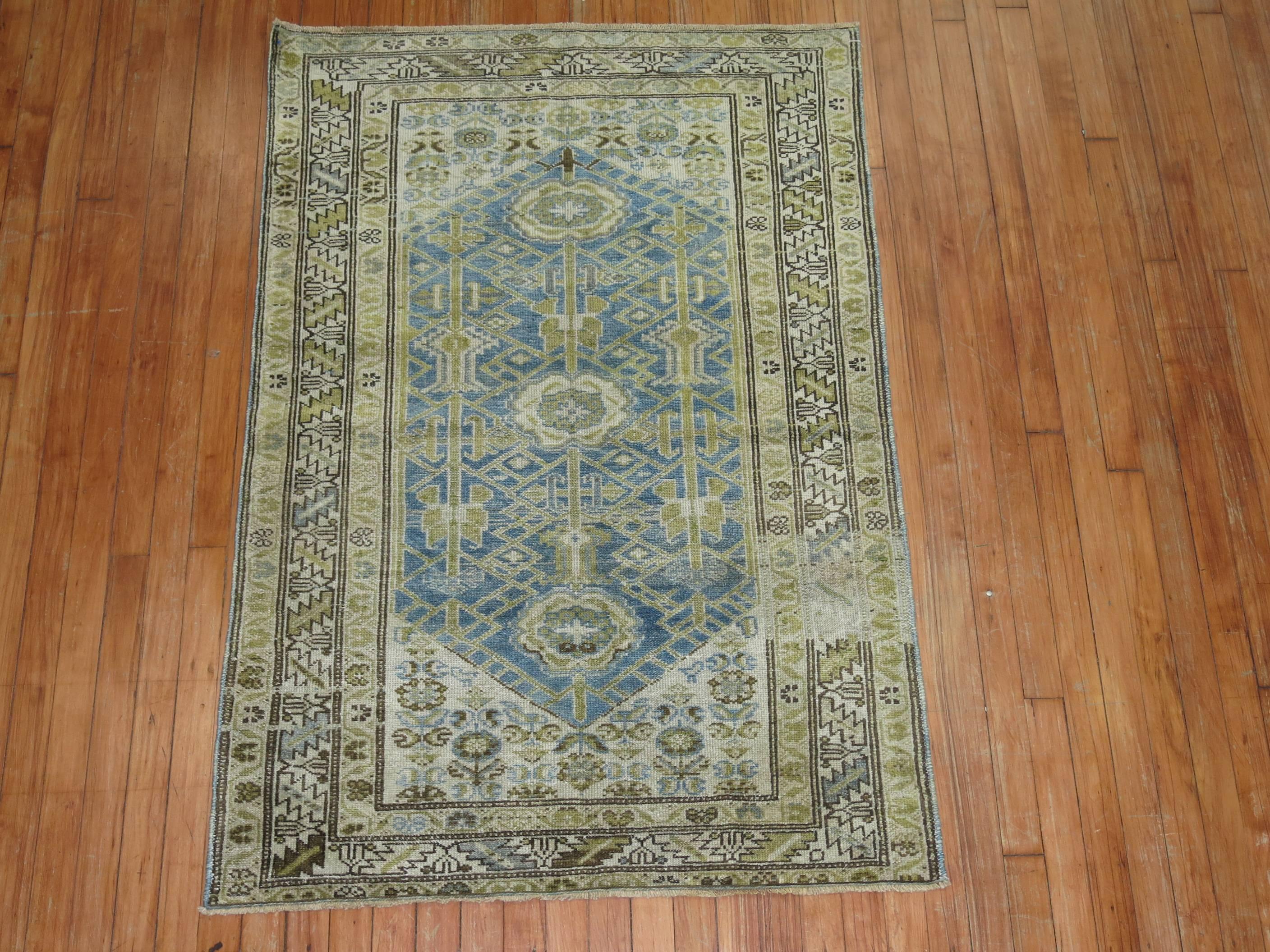 Fine quality sky blue field Persian Malayer rug.