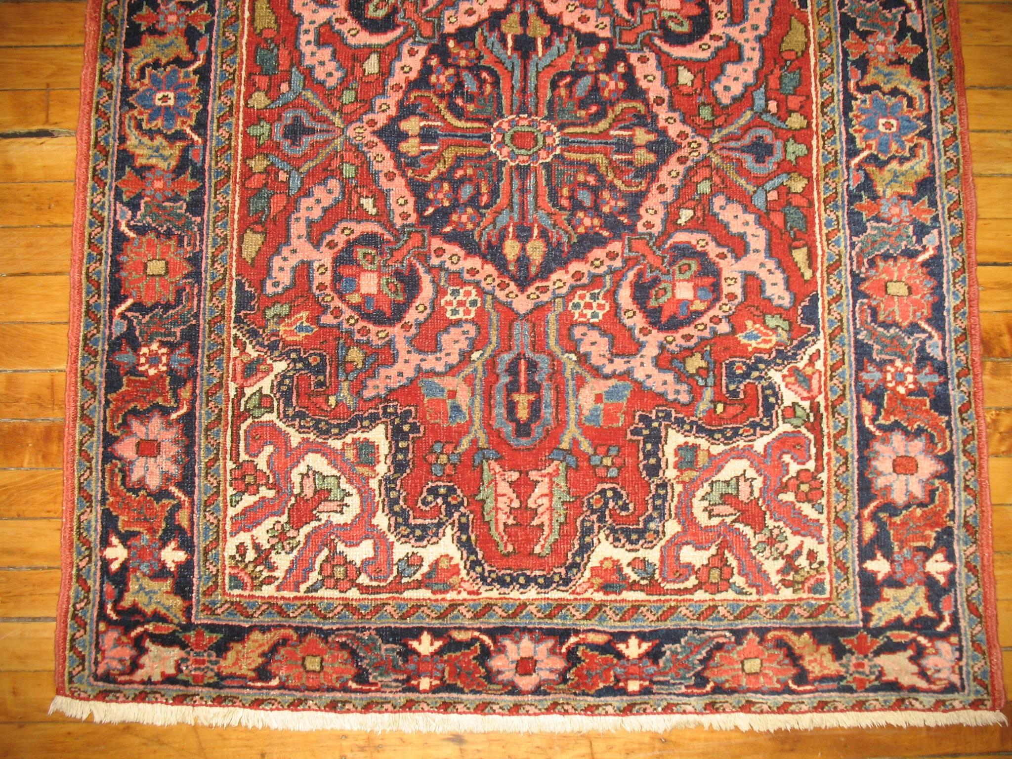 An authentic Persian Heriz azar rug from the middle of the 20th century.

3'6'' x 4'4''