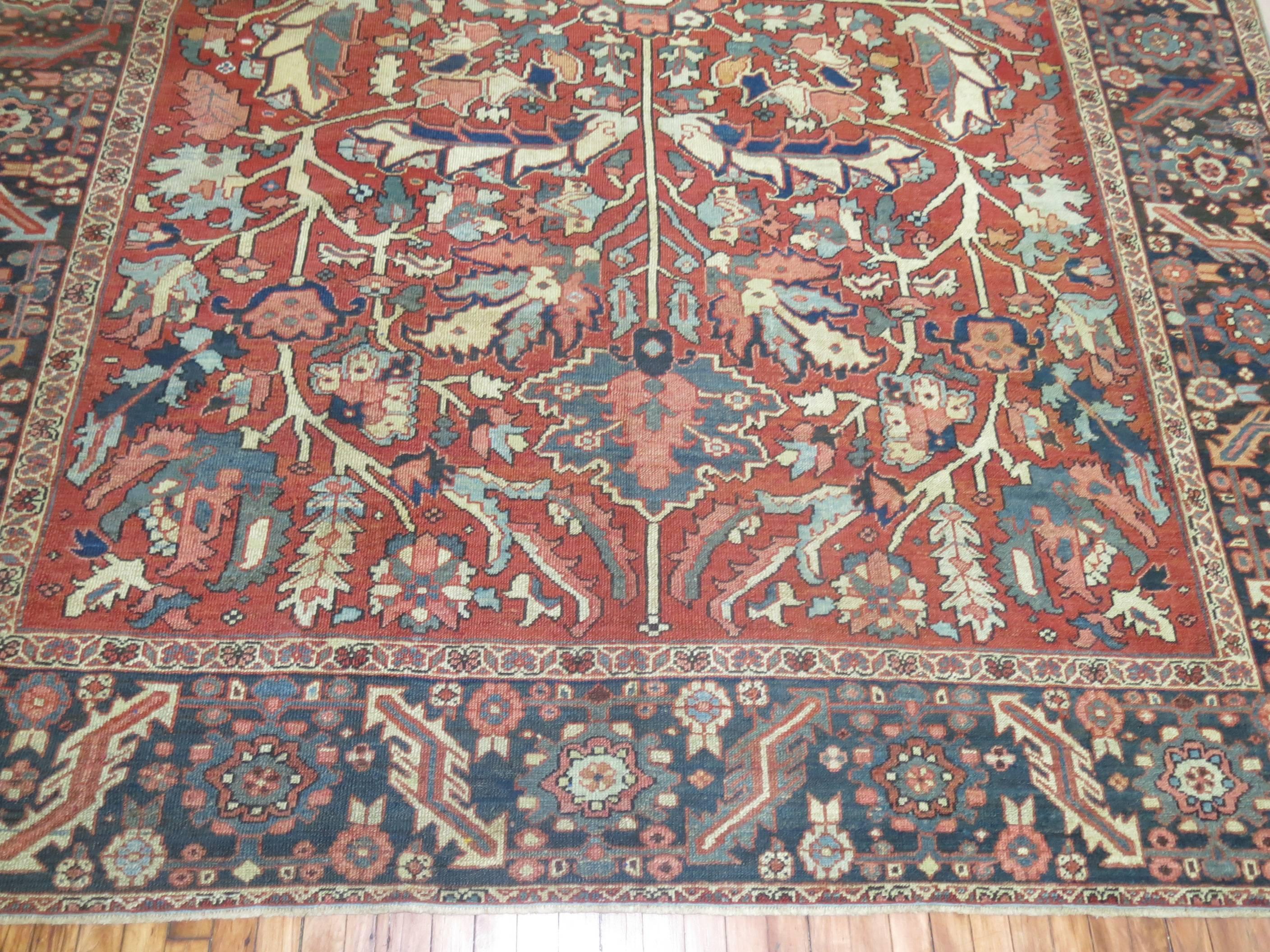 Authentic room size persian heriz rug.

9'6'' x 12'2''

The virtues of the antique Heriz carpets are found in their design style and color. The signature of a Heriz is the large medallion with overscale cornerpieces filled with angular oak leaves