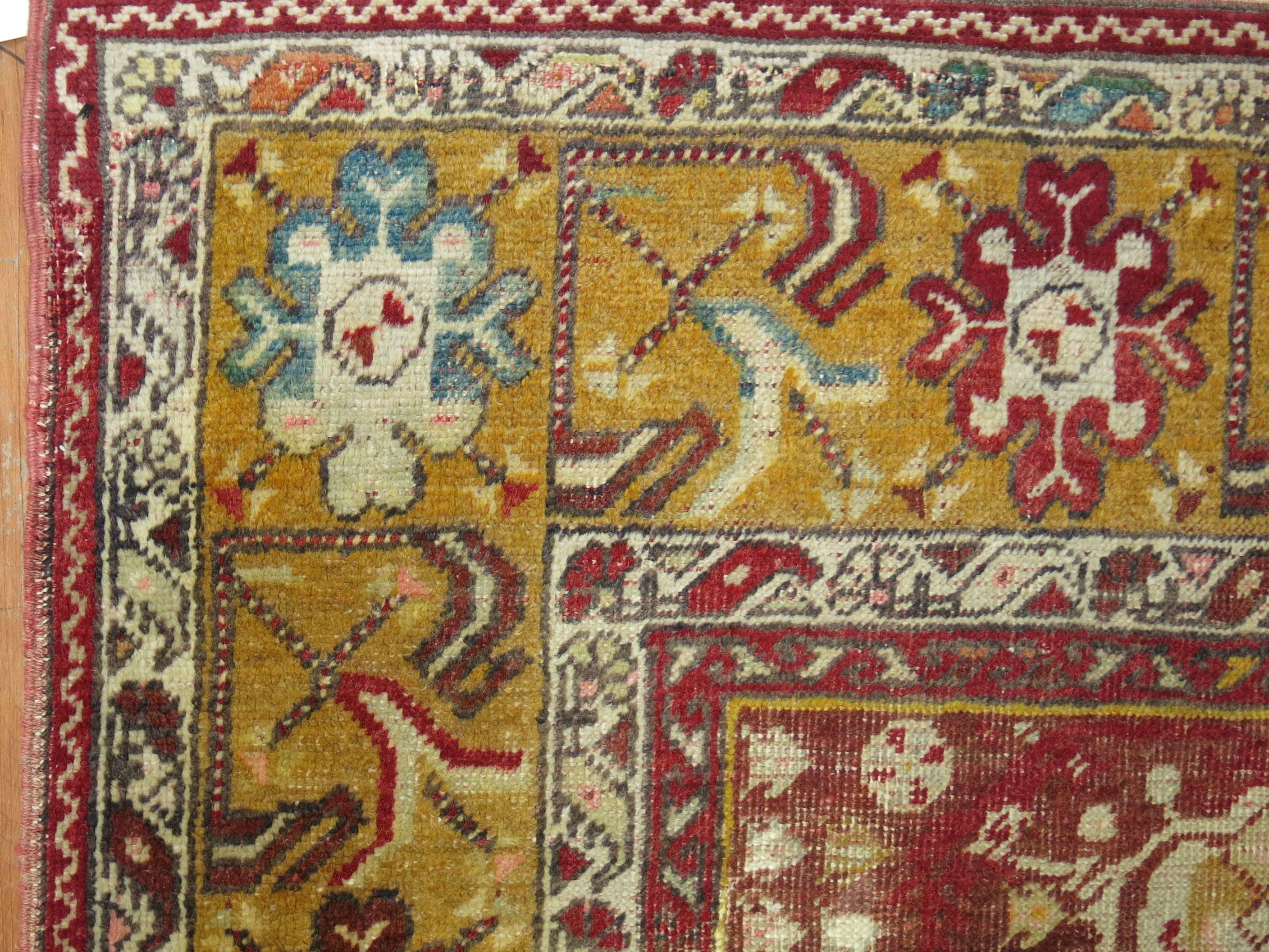 An early 20th century prayer niche motif decorative Turkish rug.

3'5'' x 5'10''