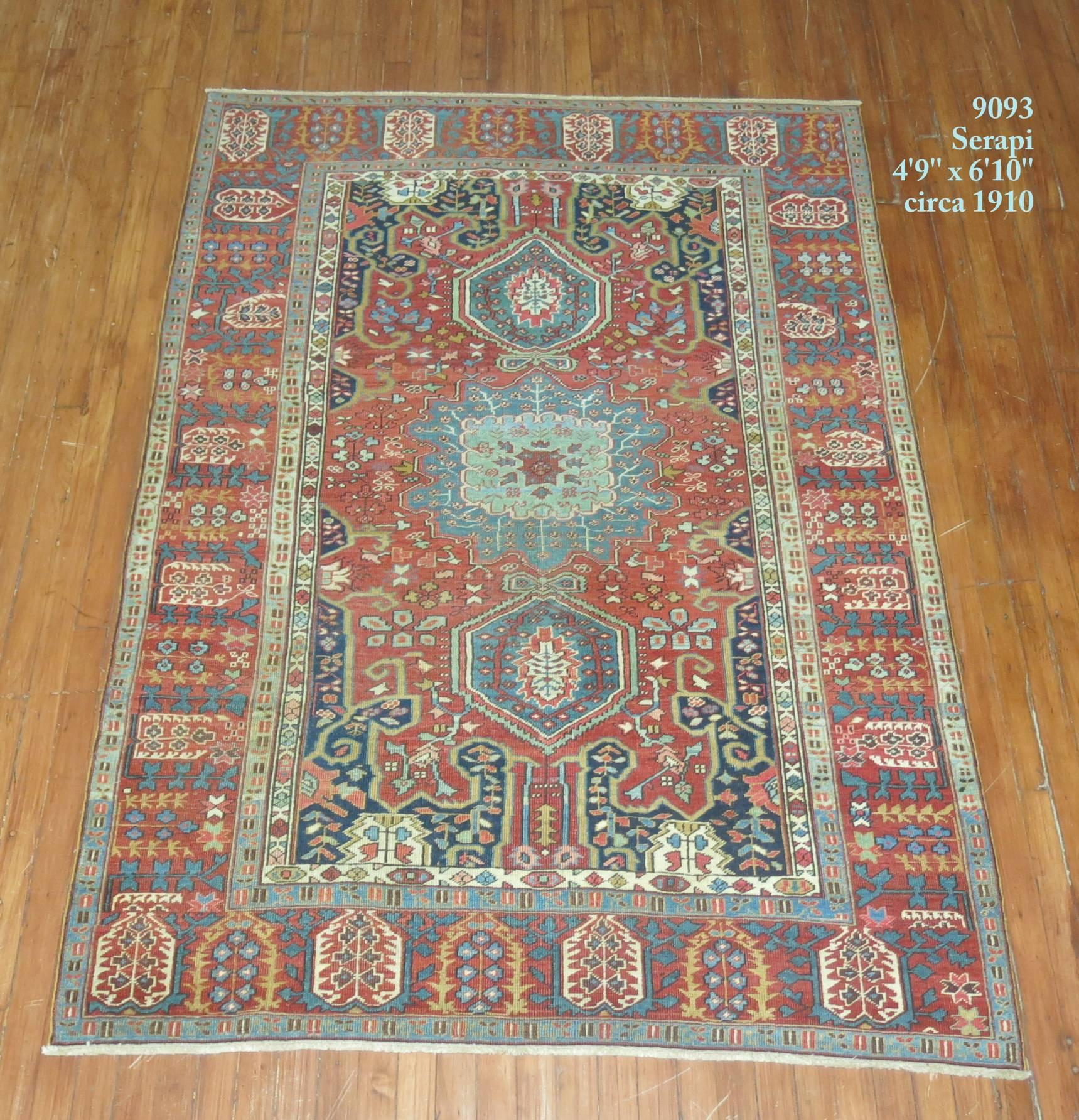 A highly decorative rare size Persian Antique Serapi rug.

4'9'' x 6'10''

With distinctive large-scale motifs and a wide ranging palette of warm colors, antique Heriz Serapi carpet are currently the most popular Persian village tribal carpets