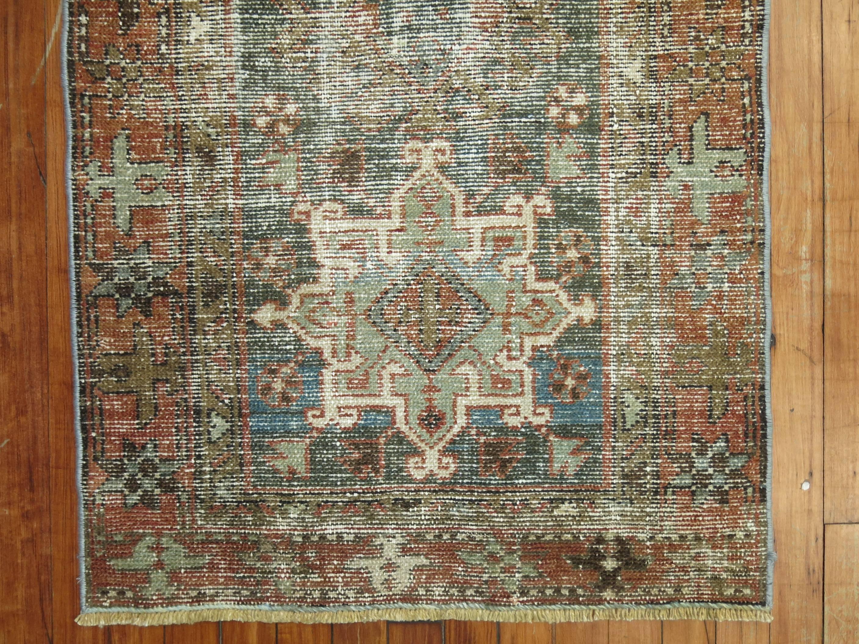 Perfectly worn Persian Heriz rug.