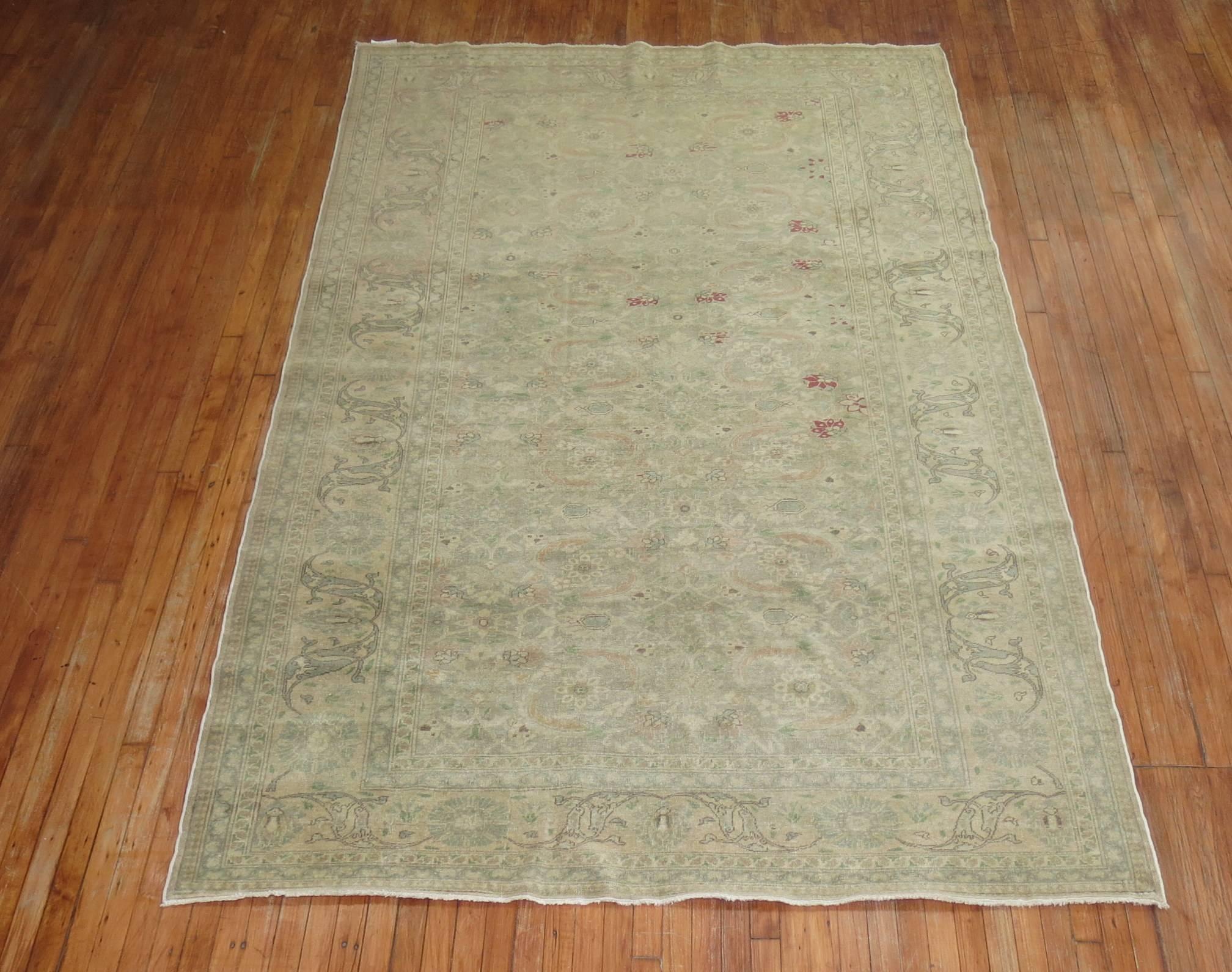 mid 20th century turkish rug in a predominant green tone

6'7'' x 9'10''

Decorative antique carpets from Sivas in the southeast are finely woven and formal, tending to interpret the classical Persian style with central medallions and all-over