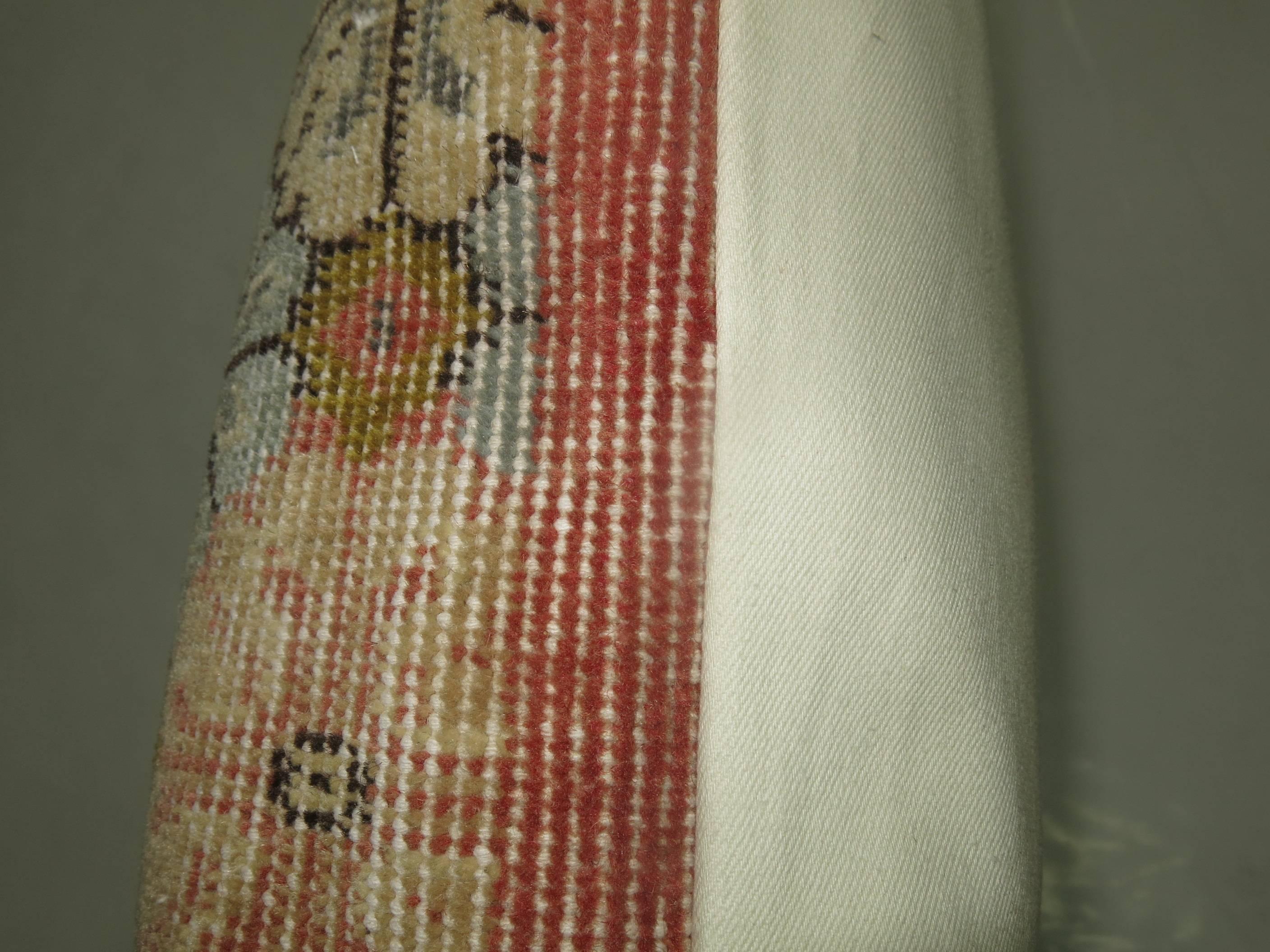 Pillow made from a shabby chic turkish rug.

24'' x 28''