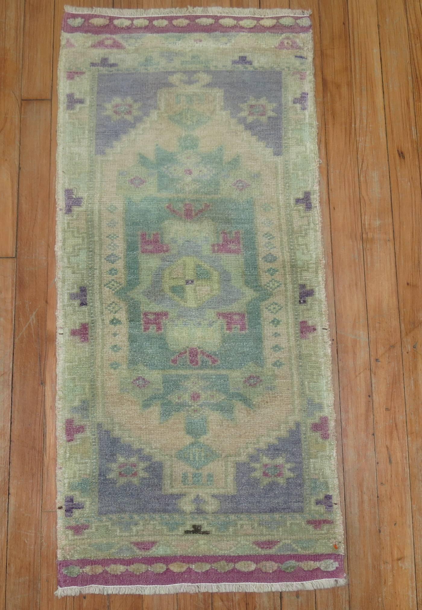 Cute turkish Oushak rug in lavender and green hues.