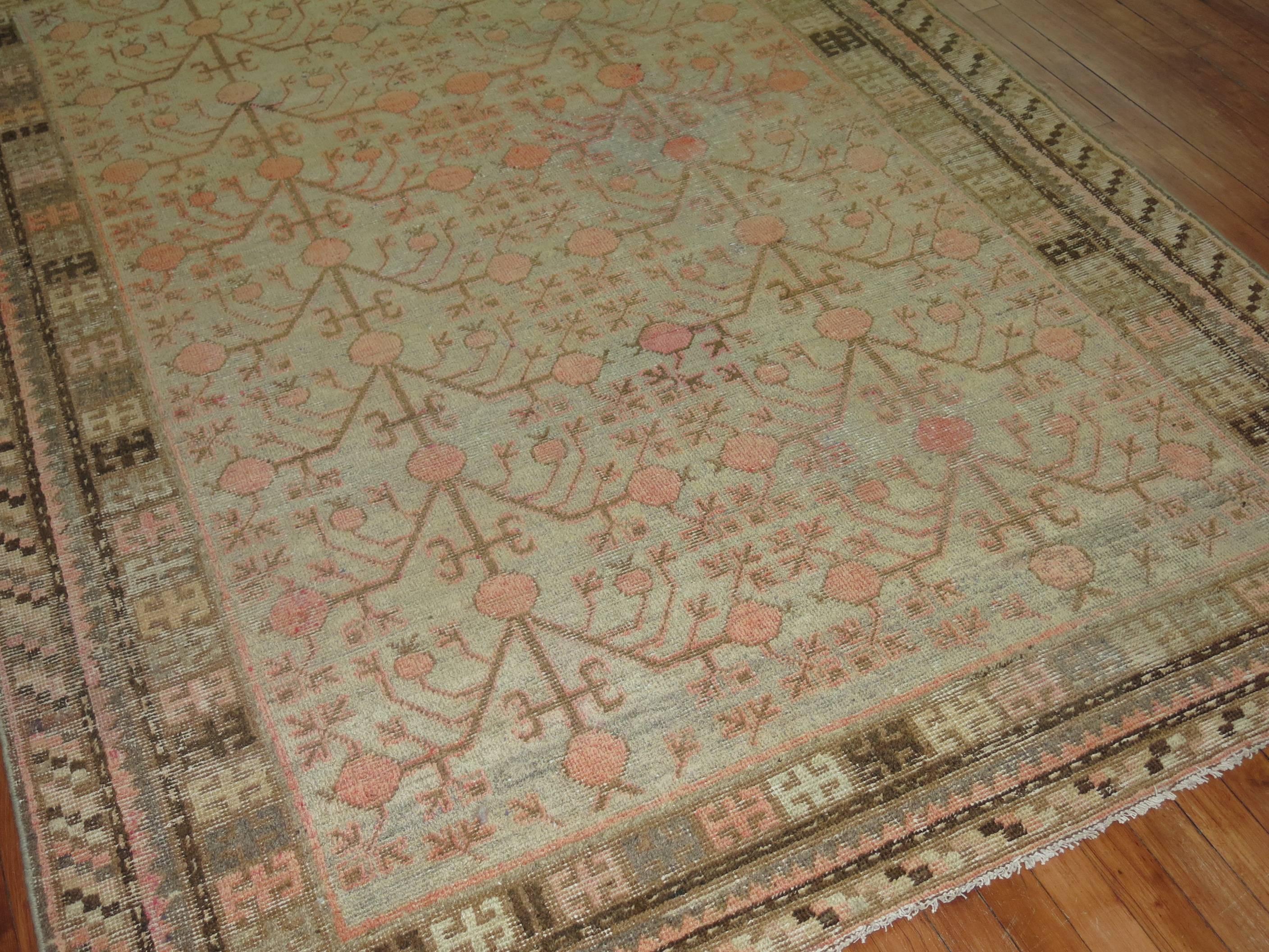 An intermediate size antique Khotan rug.

Measures: 5'8