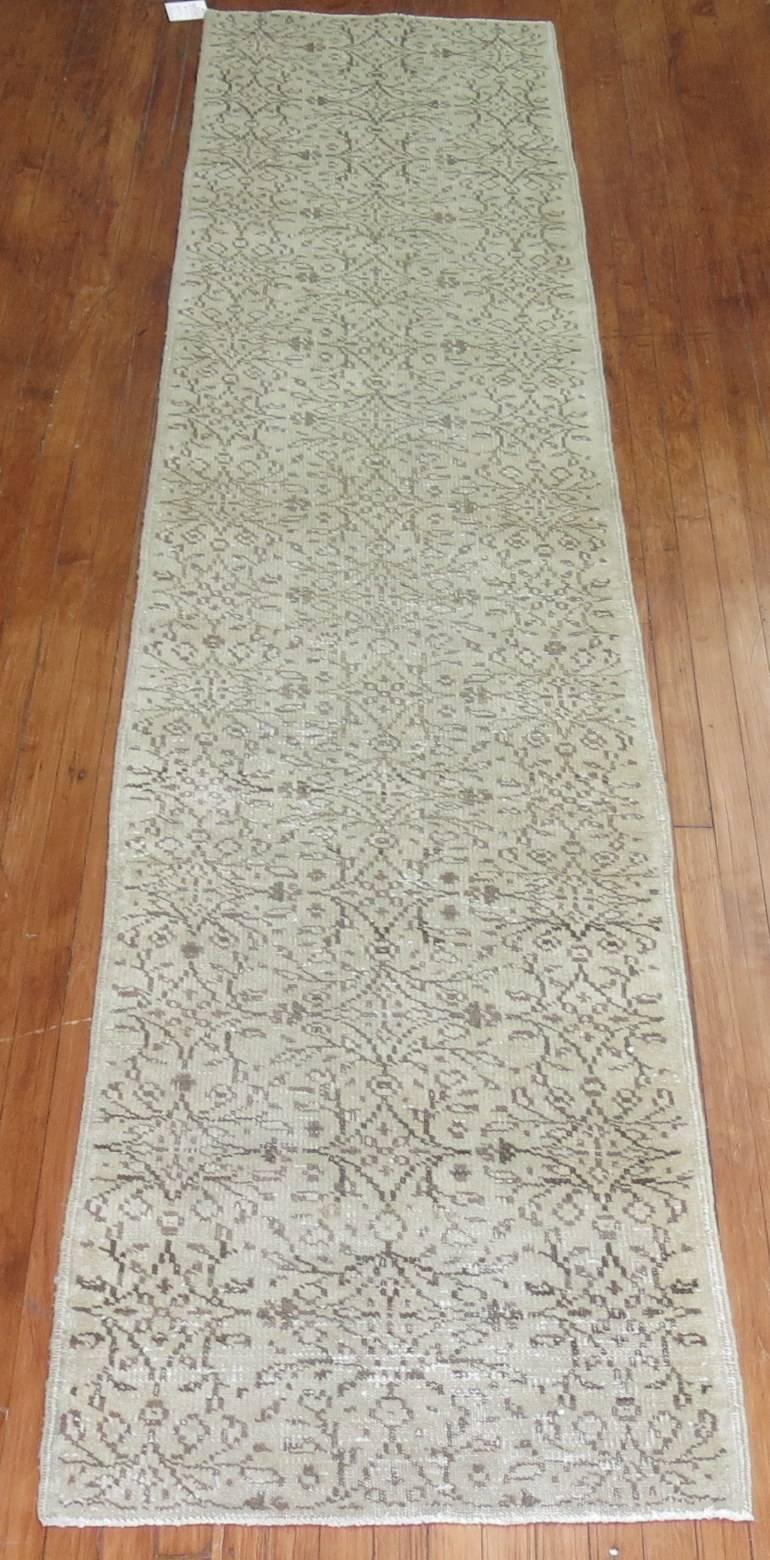 Neutral tone one of a kind Turkish runner with a borderless all over design, circa mid-20th century

Measures: 2'7” x 11'9”.