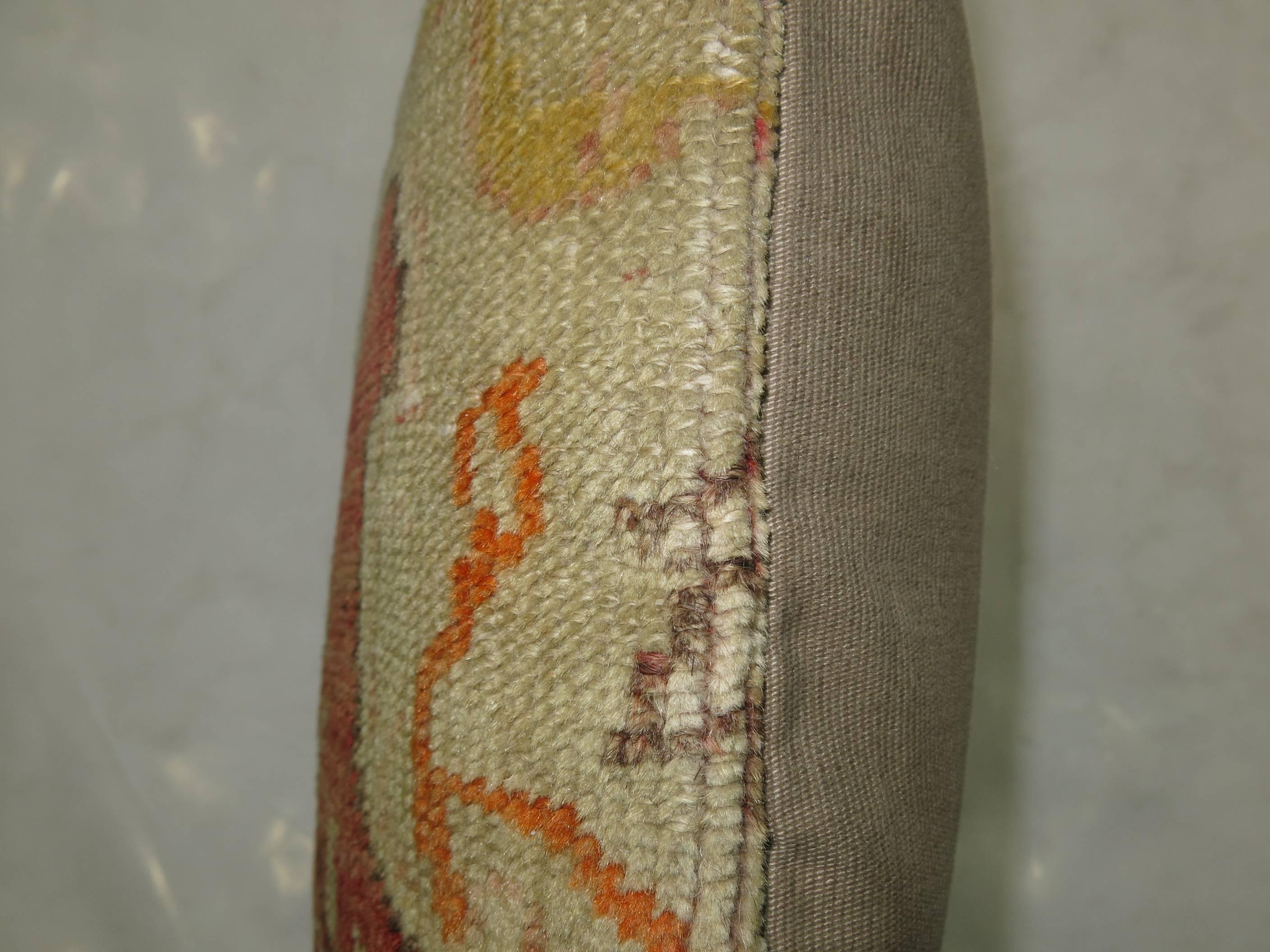Pillow made from a vintage Turkish Oushak rug.