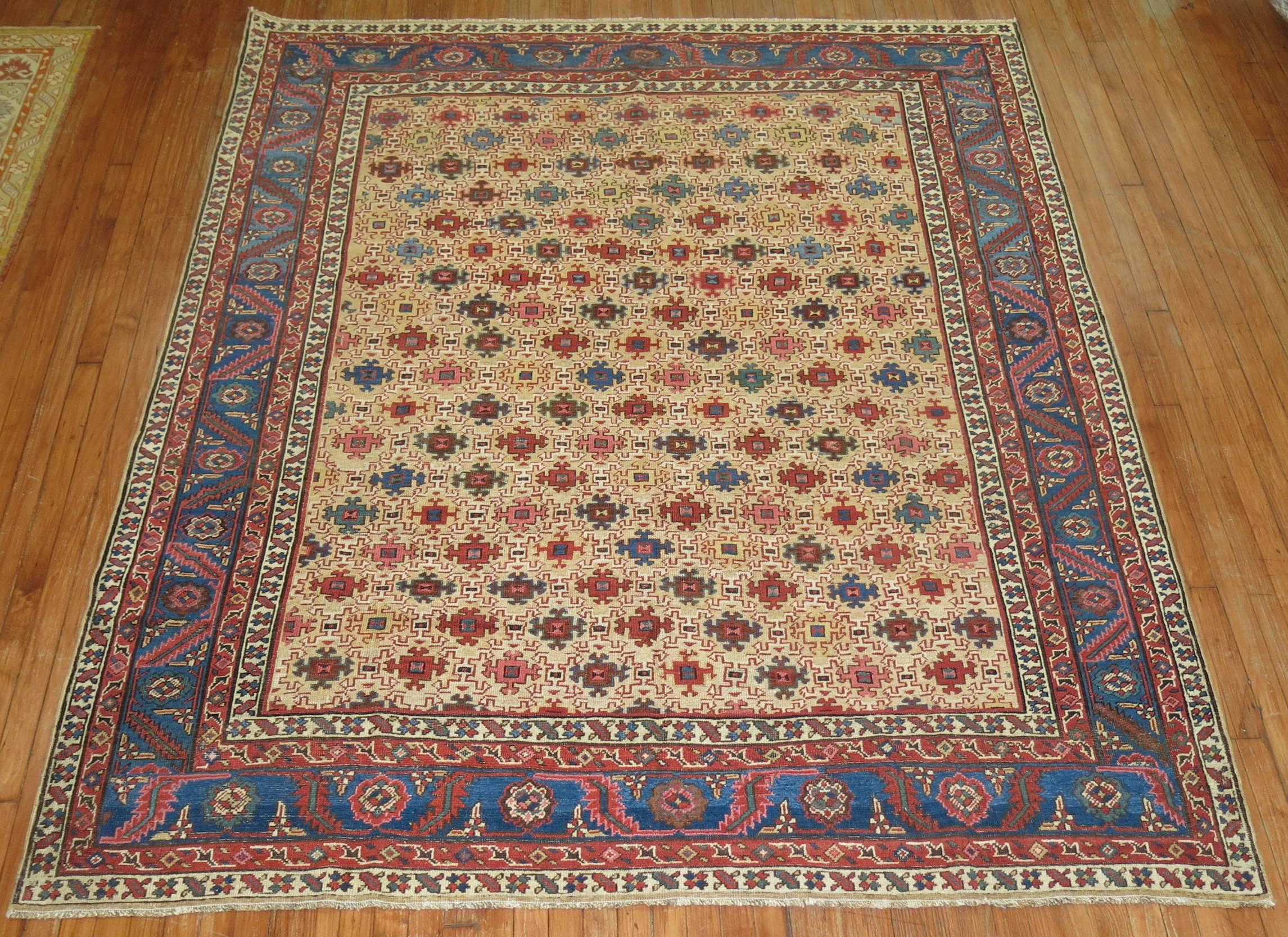 Rare size Persian Bakshaish rug with an all-over design in different assortment of colors.

20th century examples of Bakshaish weavings are very artistically distinguished and have performed as solid art investments. This particular example is an