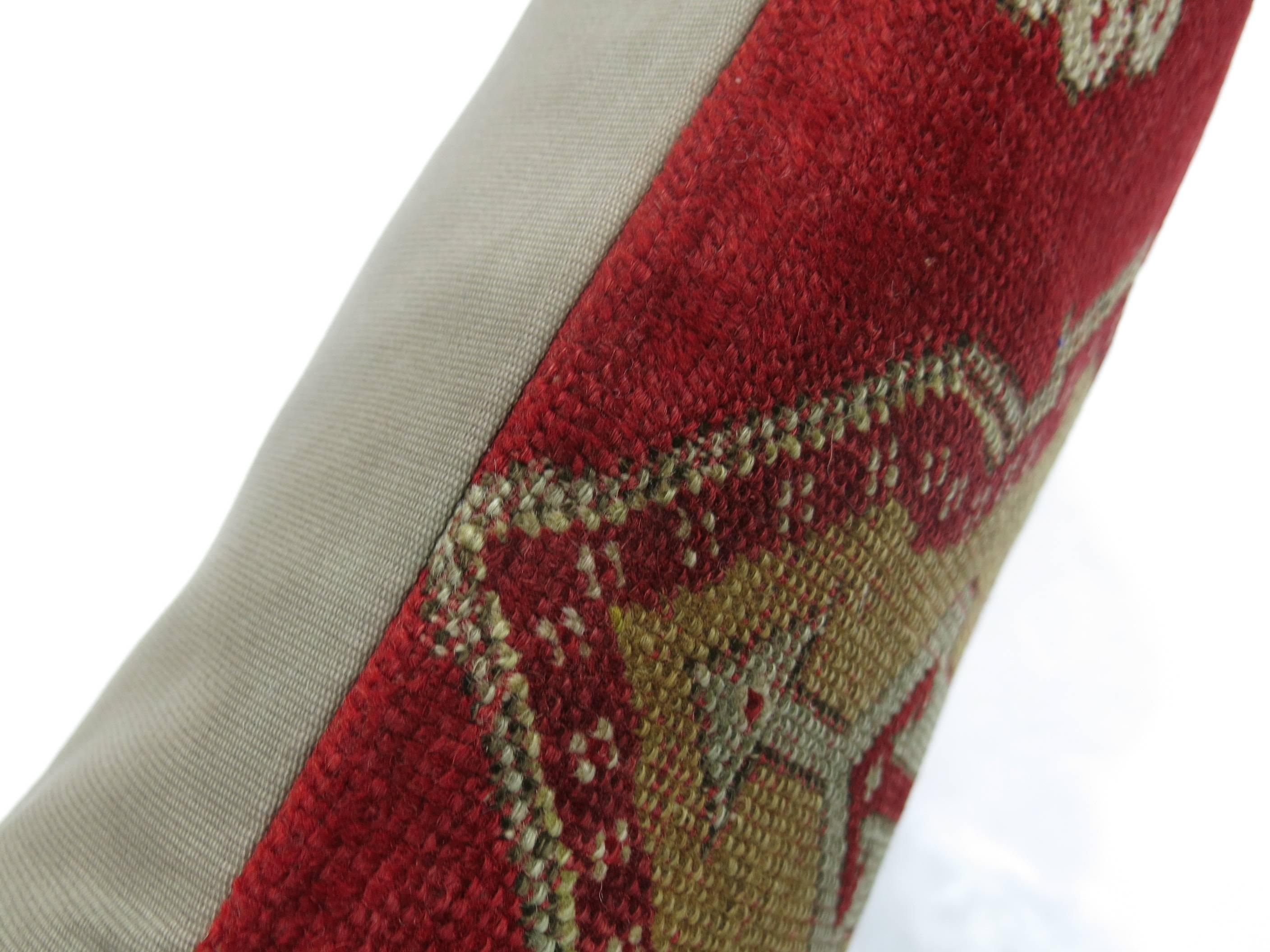 Large Pillow made from a vintage Turkish rug. Red, brown, green accents. 

18'' x 28''