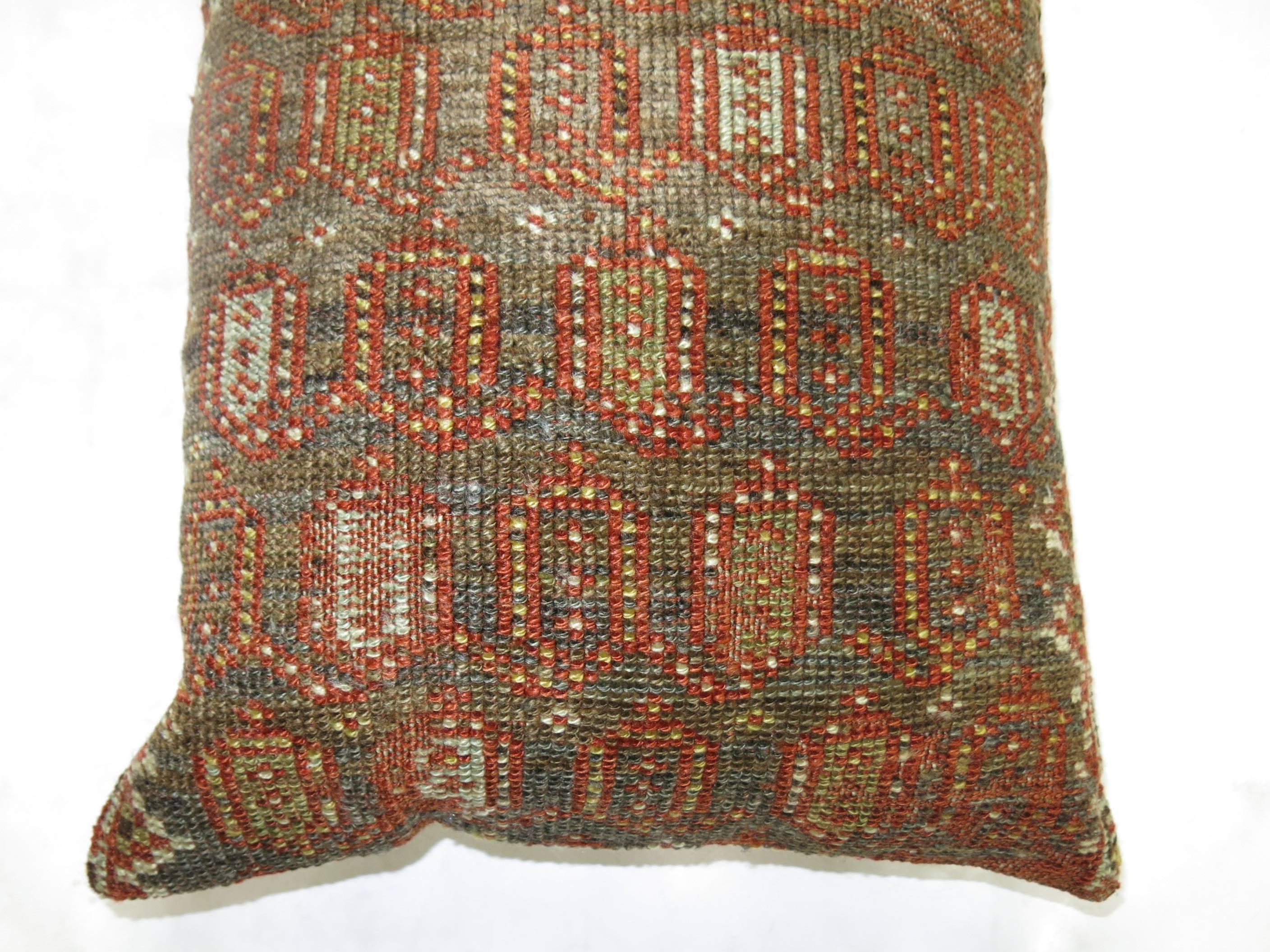 Pillow made from an antique Persian Malayer rug in dominant brown color

Measures: 16” x 24”.