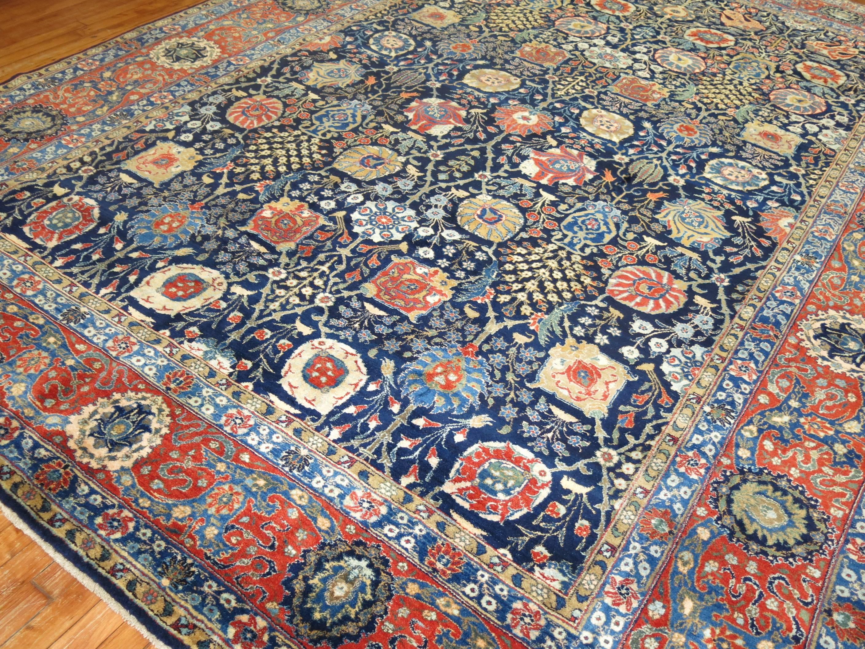 Full pile Persian Tabriz carpet featuring a pristine all-over design navy blue field. Purchased from a private estate in Manhattan, the previous owner kept this rug in their home library and kept in perfect shape.