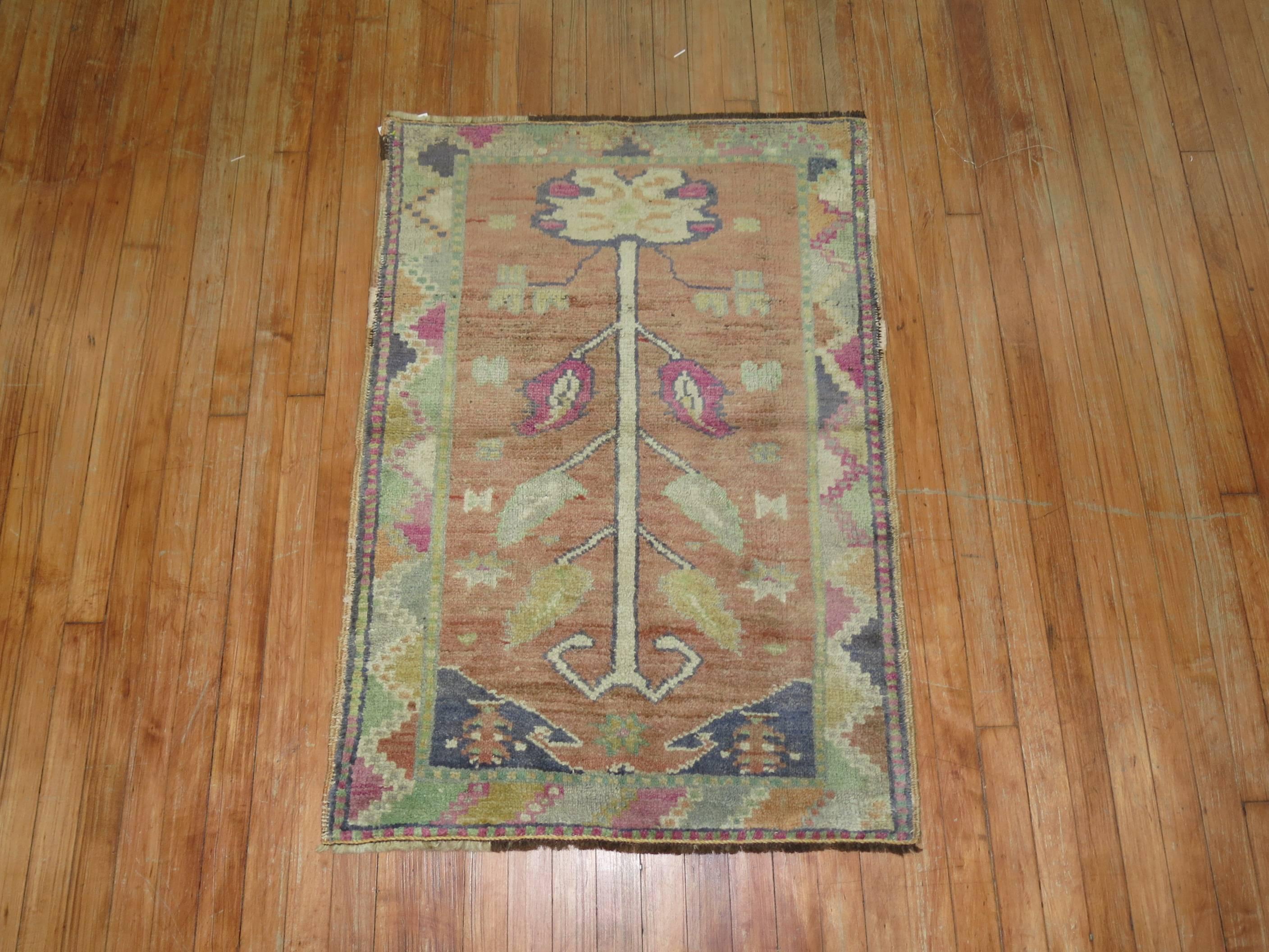 A one of a kind vintage Turkish throw rug.