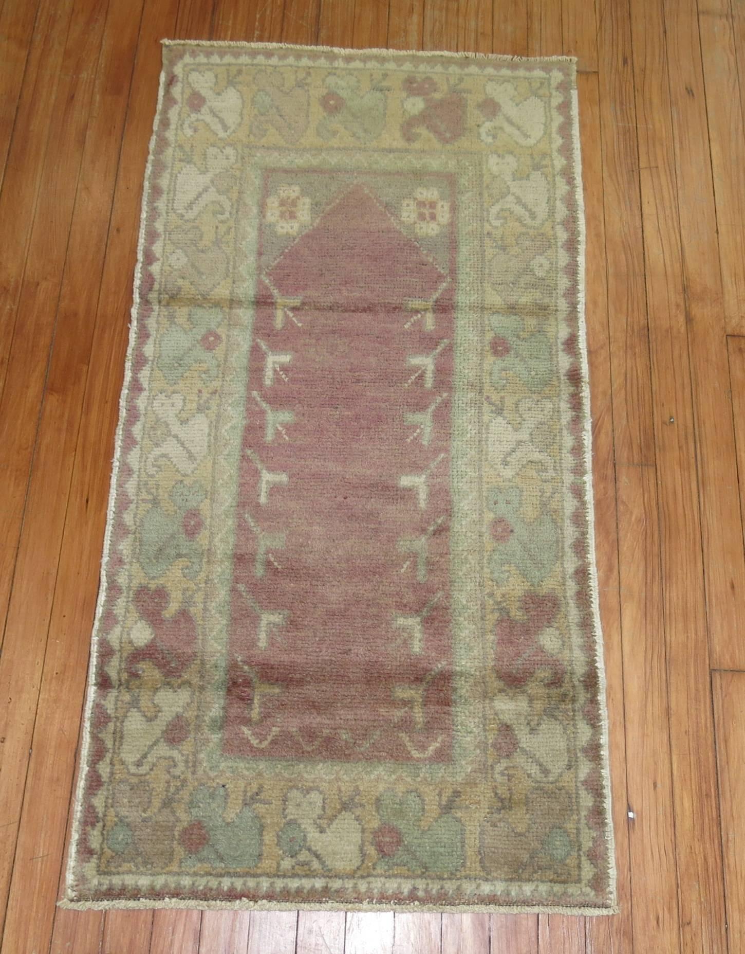 Lavender color mid-20th century Turkish Anatolian rug. 

Measures: 2'3'' x 4'3''.