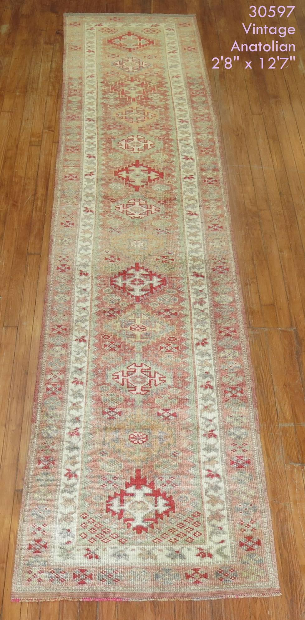 Pink Background Vintage Turkish Anatolian 20th Century Primitive Runner In Excellent Condition For Sale In New York, NY