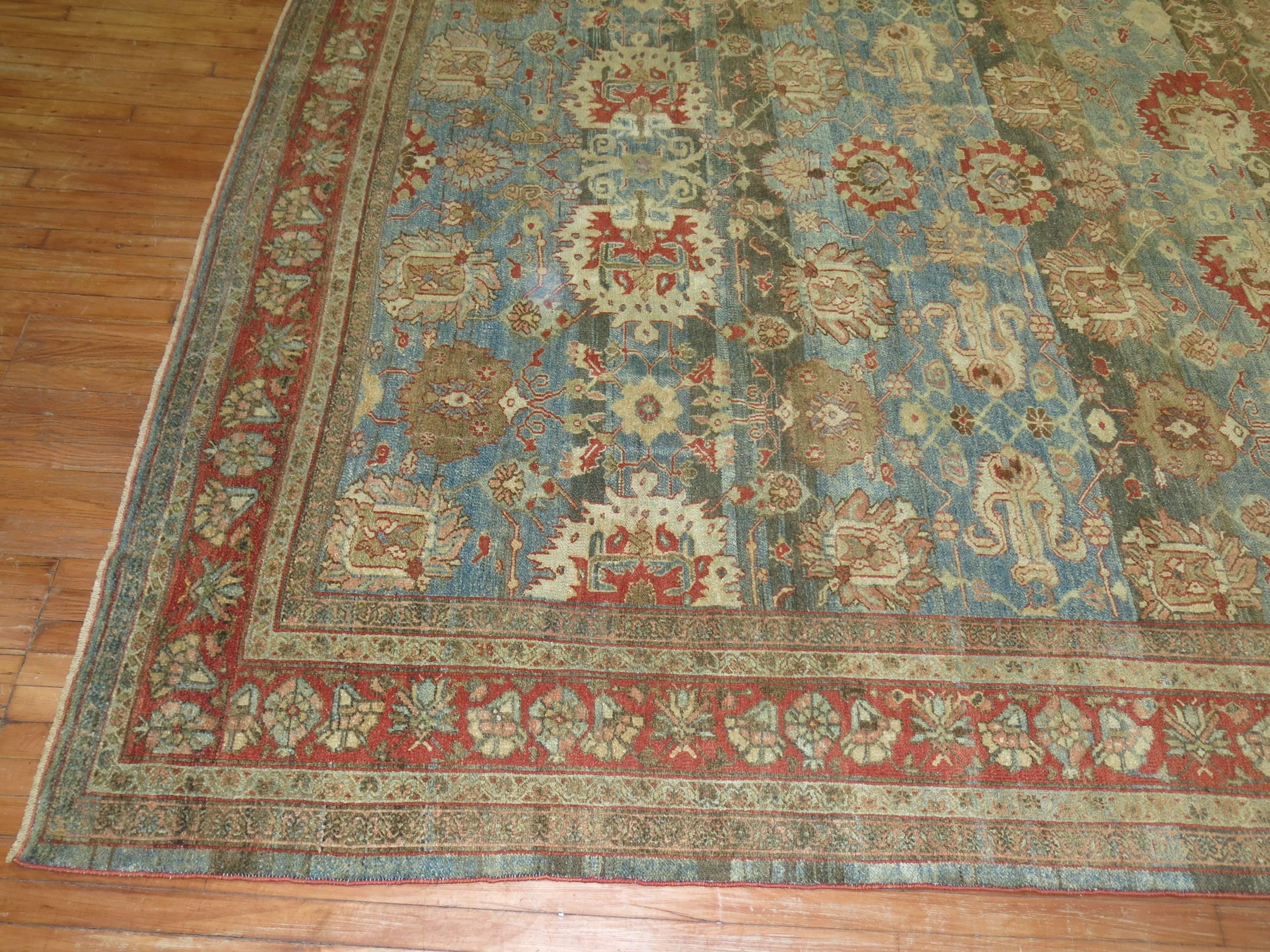 Stunning rare room size Persian Malayer rug with an abrashed blue / green field, accents in terracotta. Persian Malayer rugs are typically found in scatter size or gallery size formats. Not often found in a room size like this stellar example.