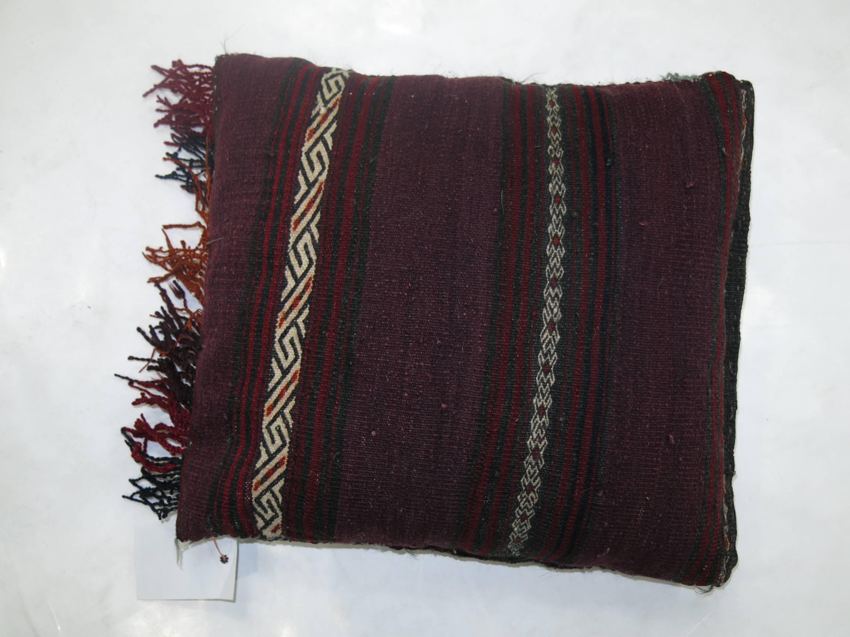 Pillow made from a vintage Balouch rug. Sewn shut.