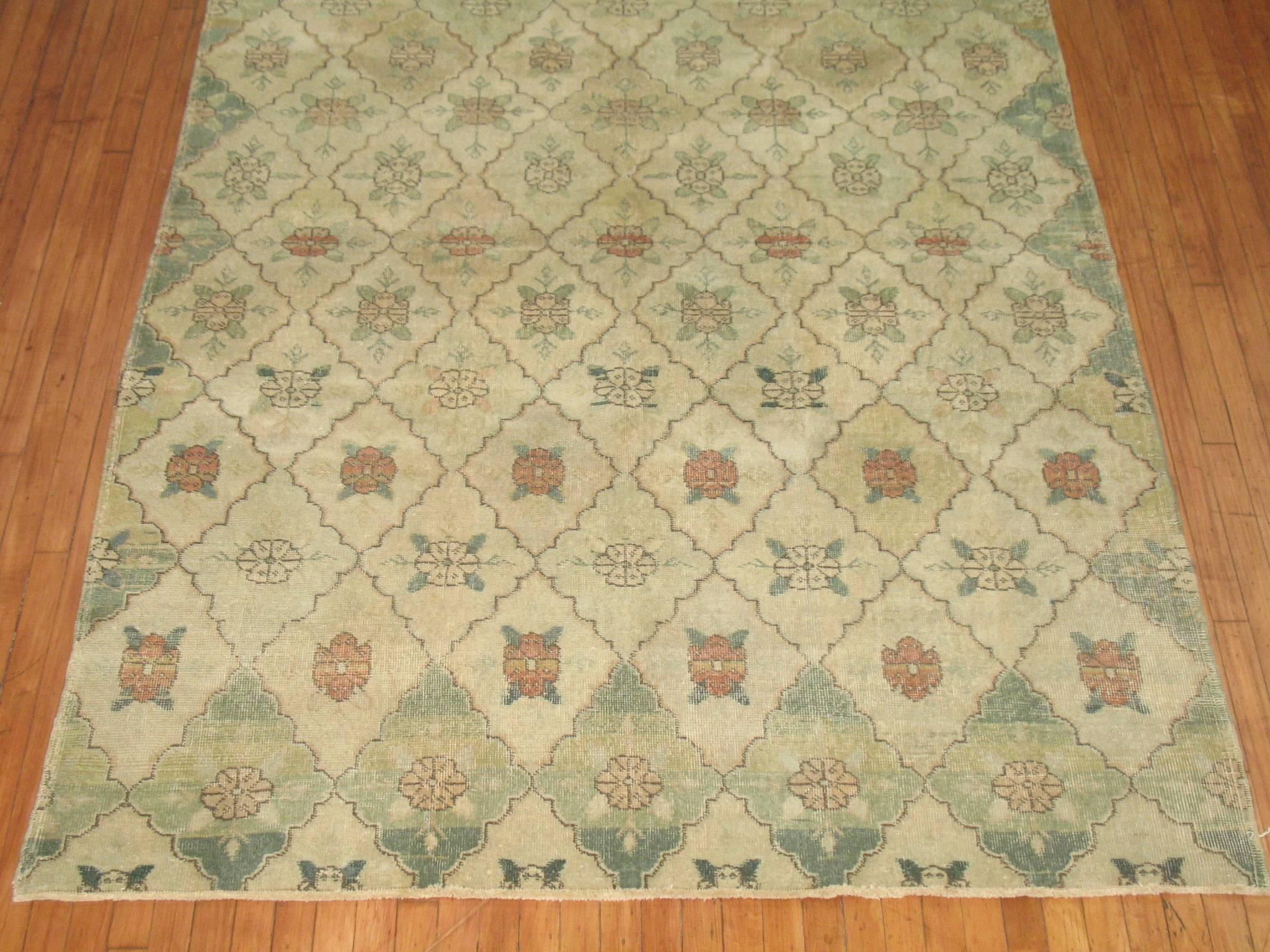 Vintage Turkish Deco rug with an all-over repetitive design in soft green hues.

Measures: 6'1