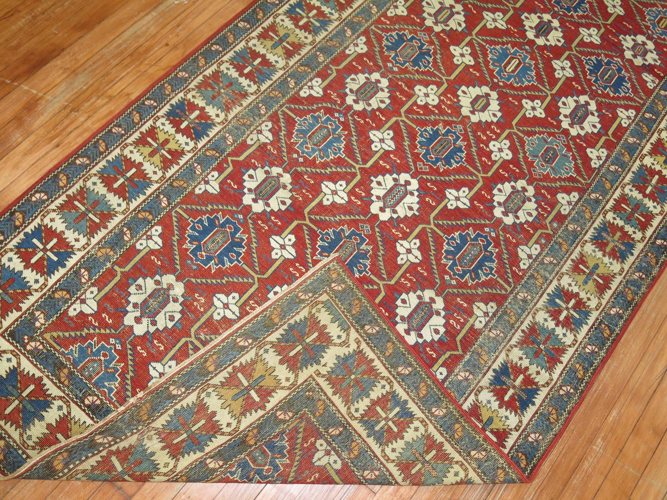 Super fine quality 19th century antique Shirvan rug. Blue, green and ivory accents on a rich red field


Measure: 4' x 7'9