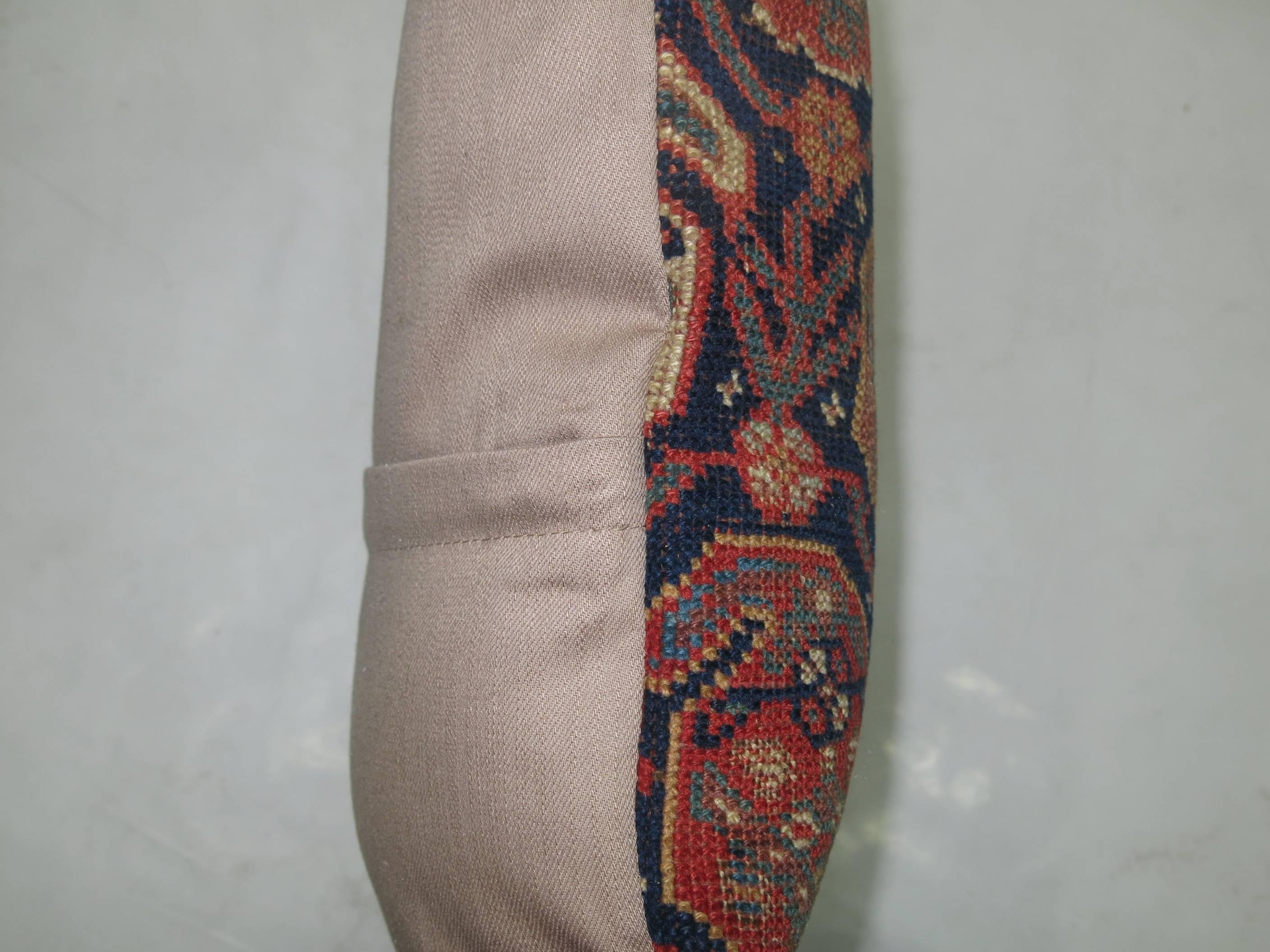 Pillow made from a 19th century antique Persian Afshar rug with cotton back. Zipper closure.

Measures: 19” x 20”.