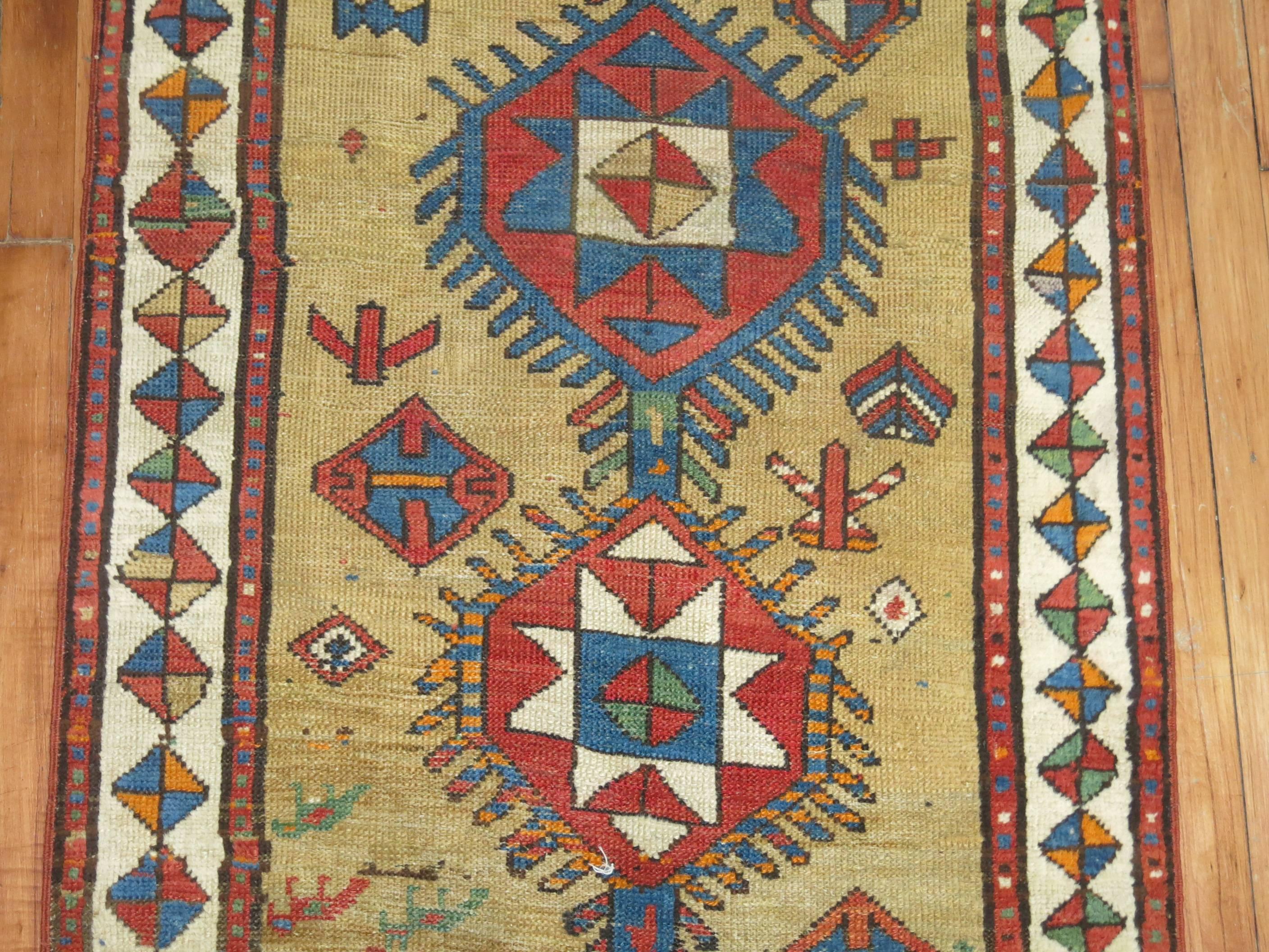 An early 20th century tribal camel ground Persian Serab runner.

Measures: 2'7'' x 9'4''.