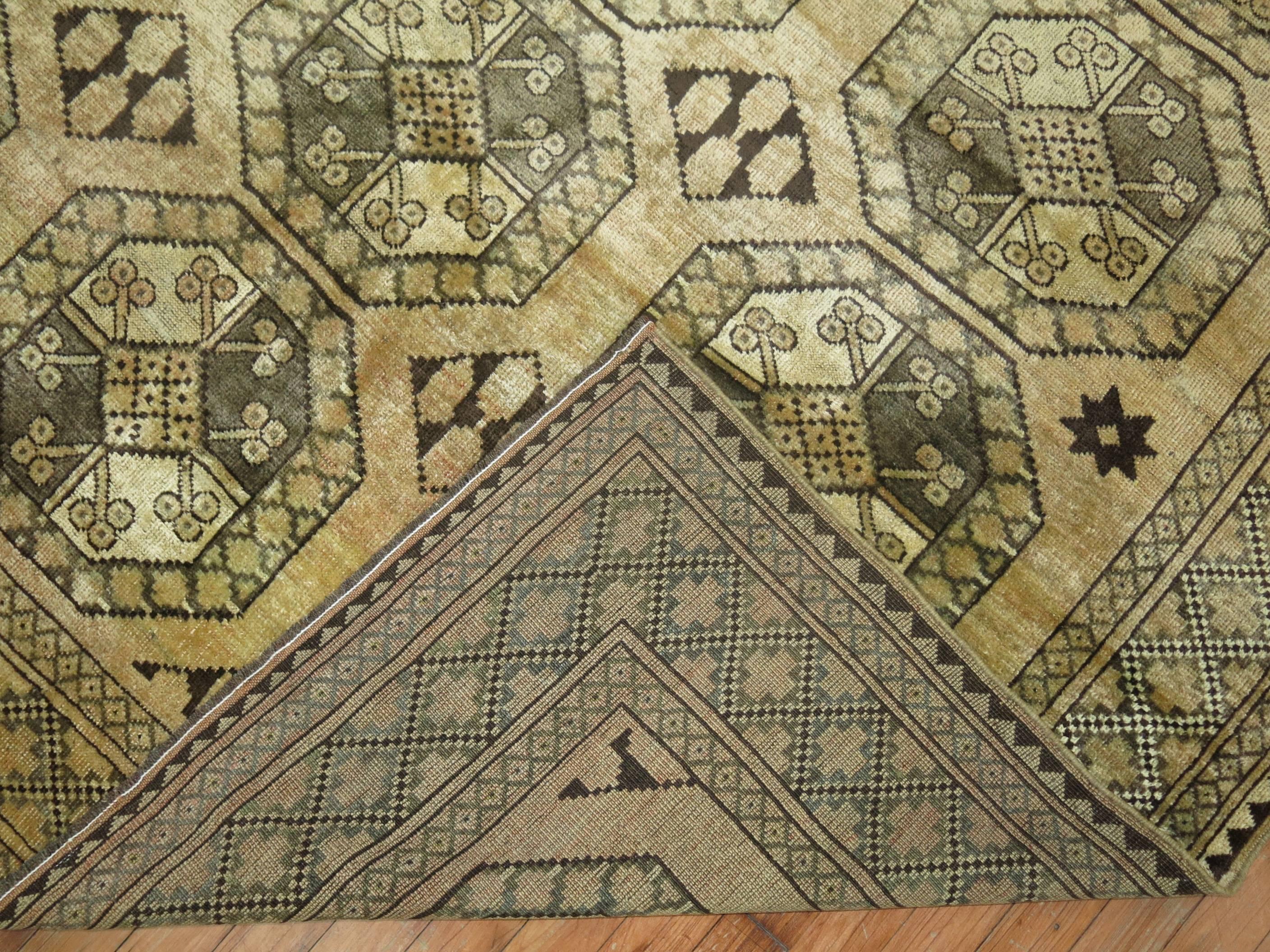A 20th century square and intermediate size Ersari carpet in tan and brown, circa 1930.

Measures: 6'3'' x 8'3''.