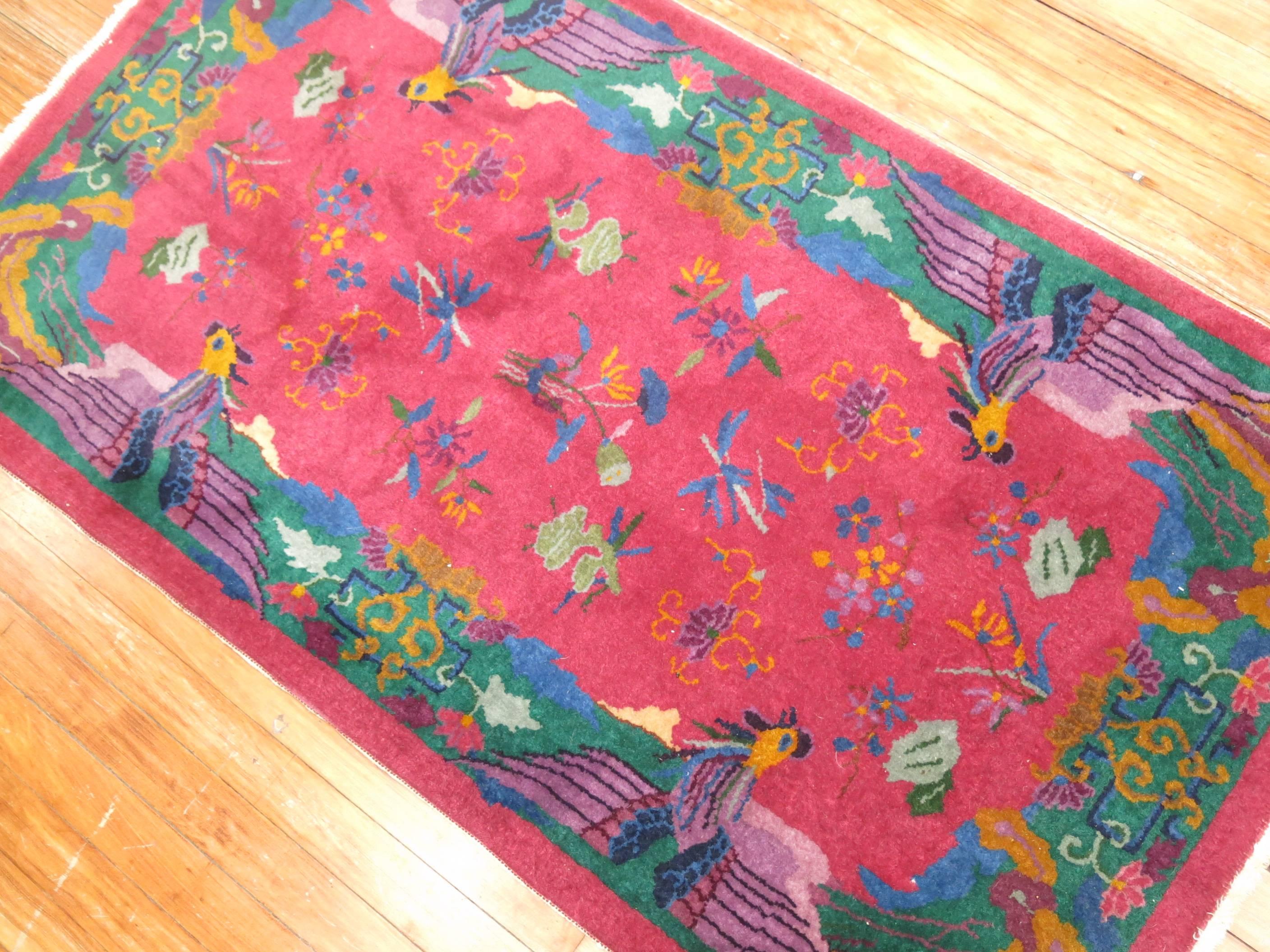 Bright jewel color toned Nichols Chinese Art Deco rug.