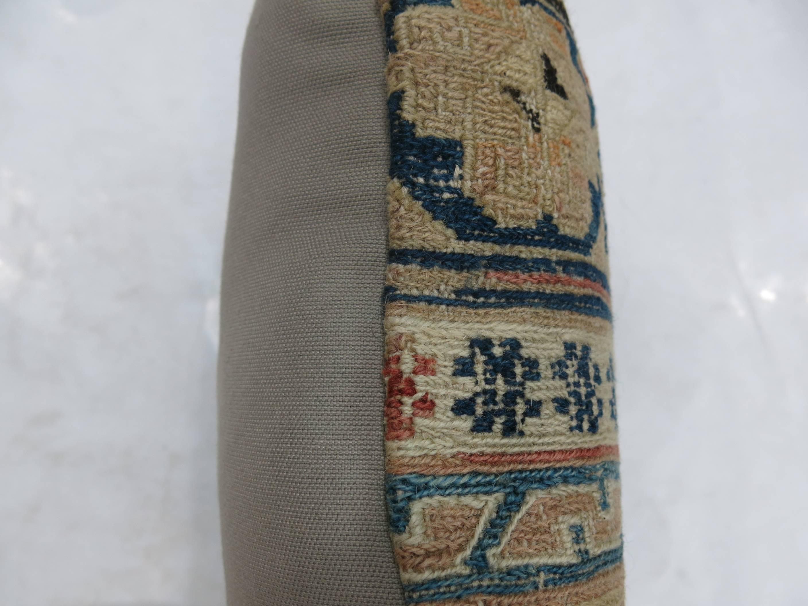 Pillow made from a flat-weave 19th century Soumak rug.