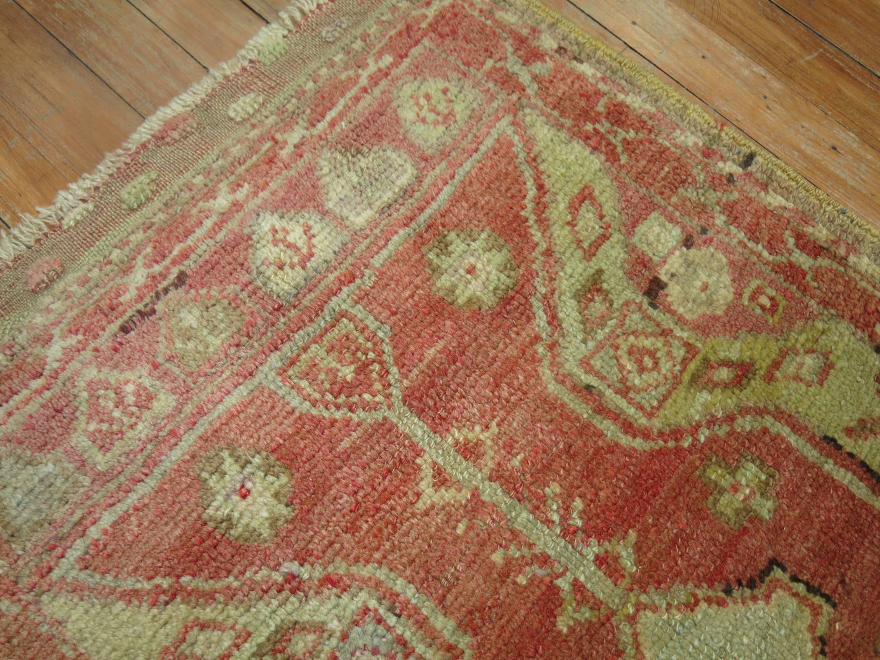 An early 20th century antique Oushak rug mat.